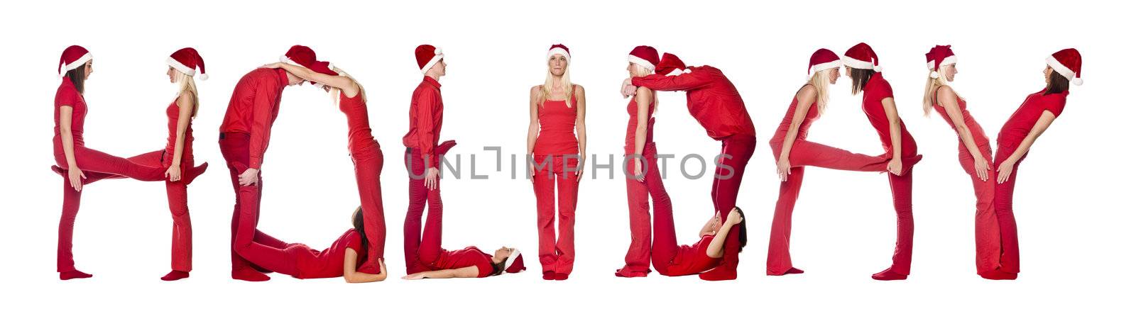 Group of red dressed people forming the word 'HOLIDAY', isolated on white.