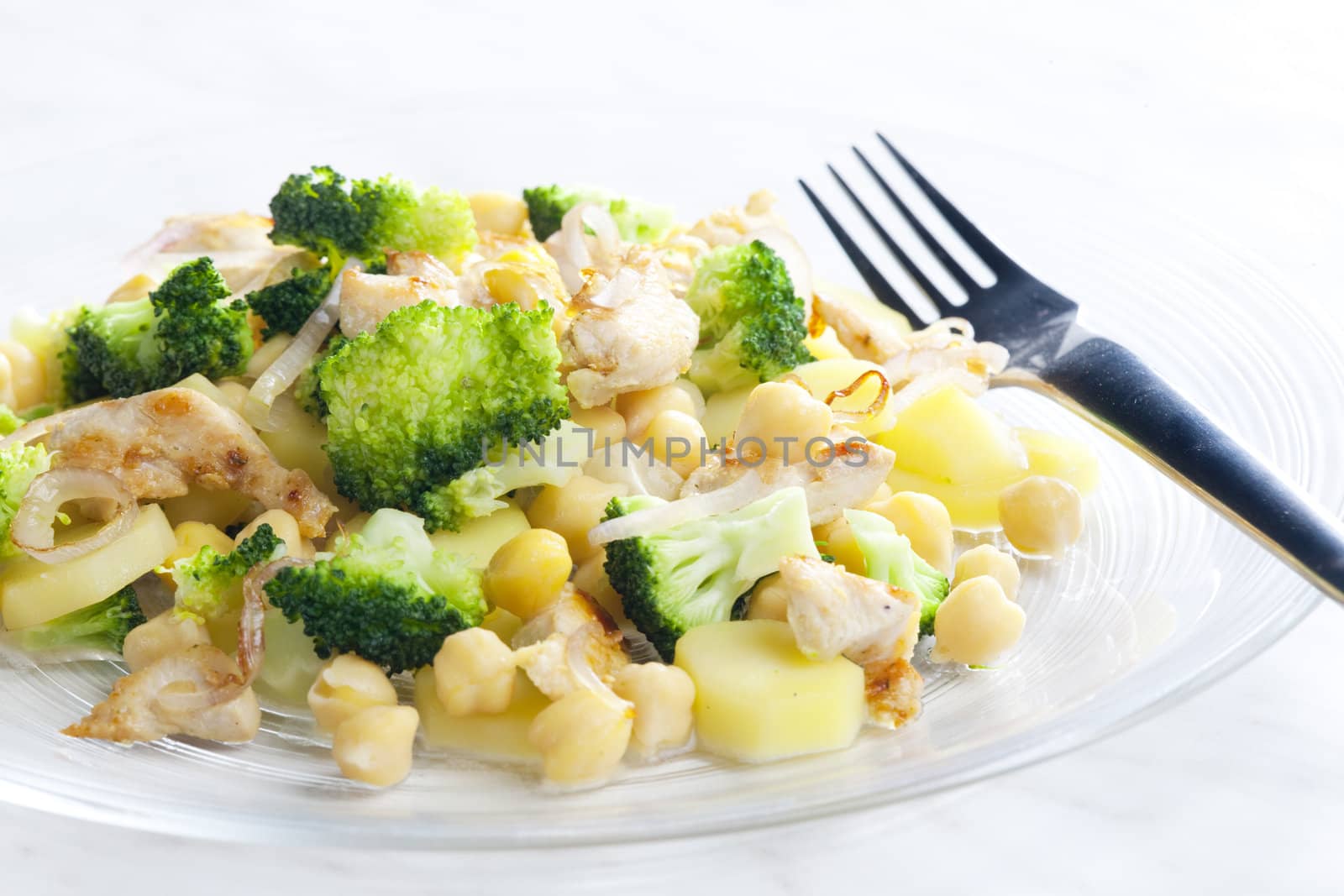 chicken meat with broccoli, chick peas and potatoes