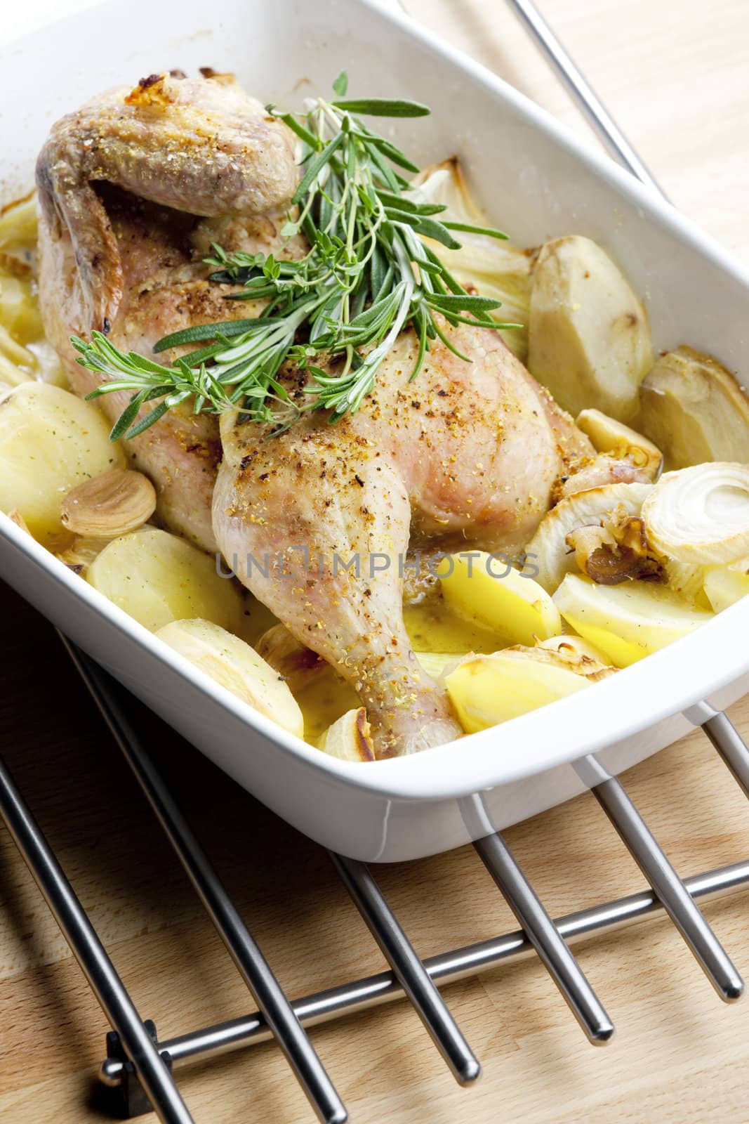 chicken baked with onion and potatoes