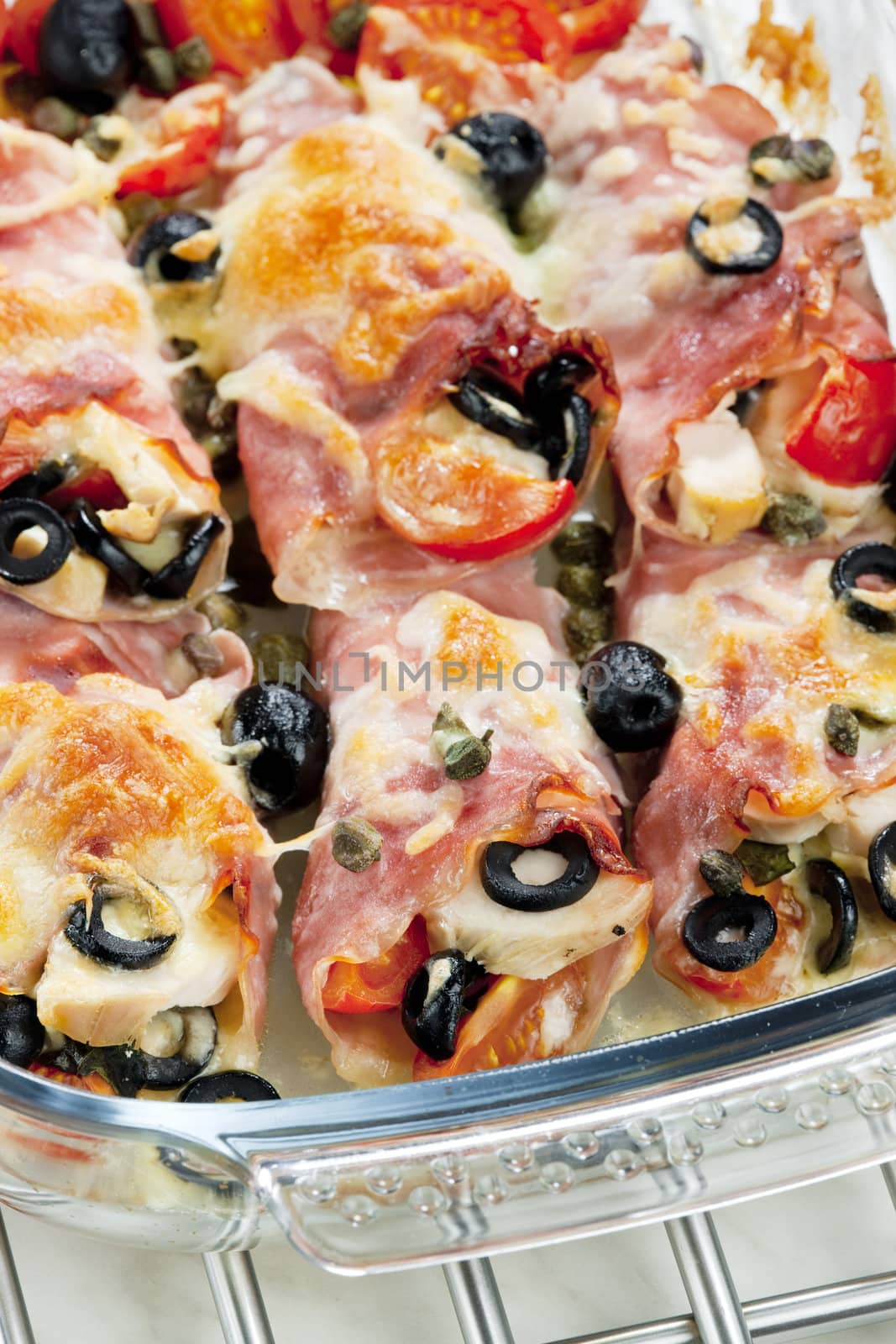 baked ham rolls filled with chicken meat and black olives