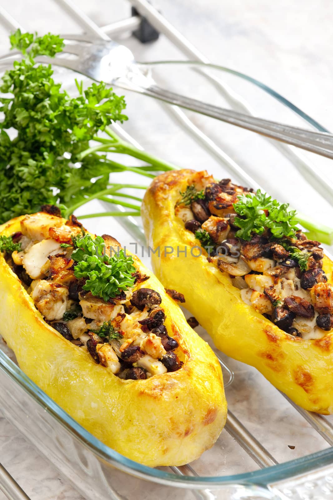 chicken meat with black beans baked in potatoes