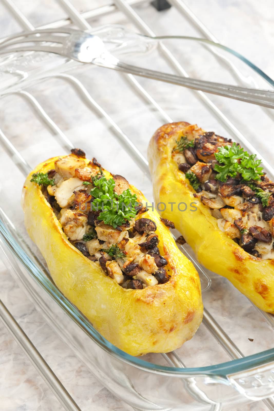 chicken meat with black beans baked in potatoes