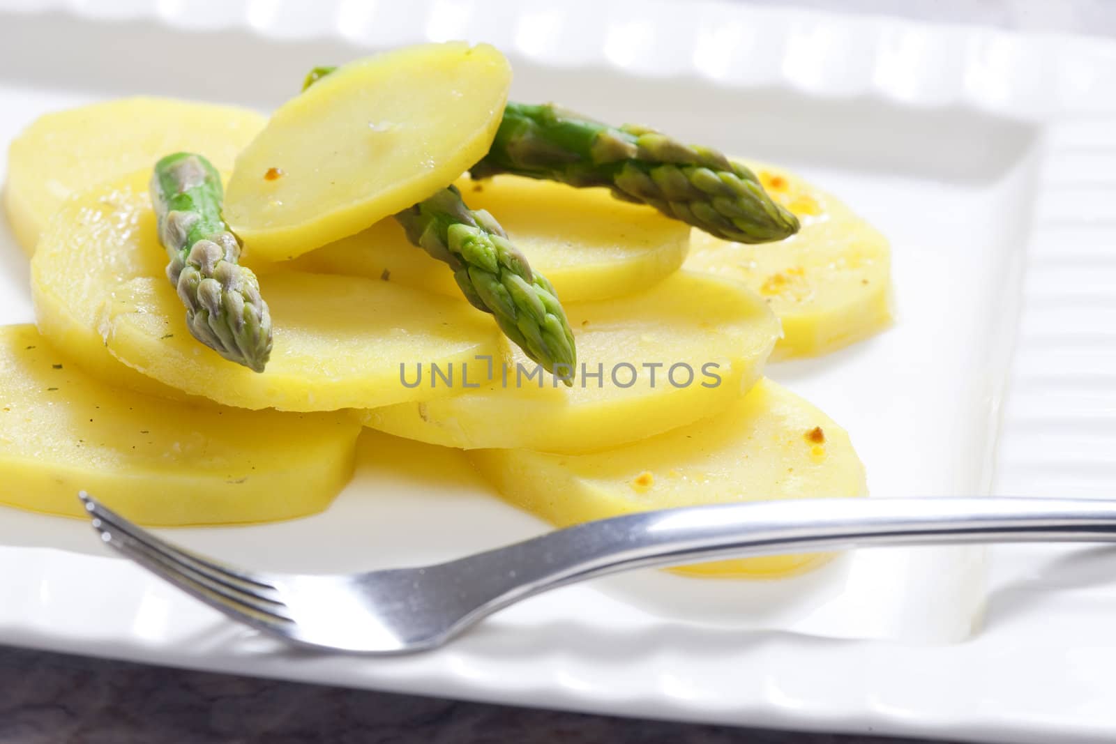 cooked potatoes with asparagus