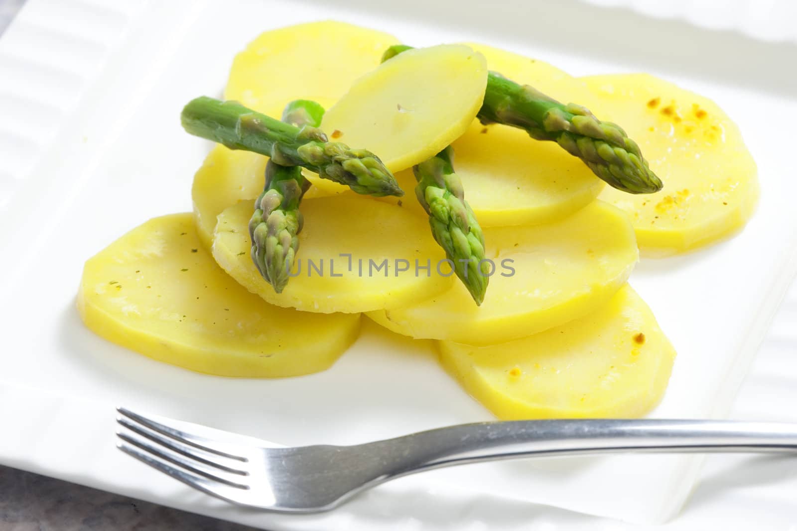 cooked potatoes with asparagus