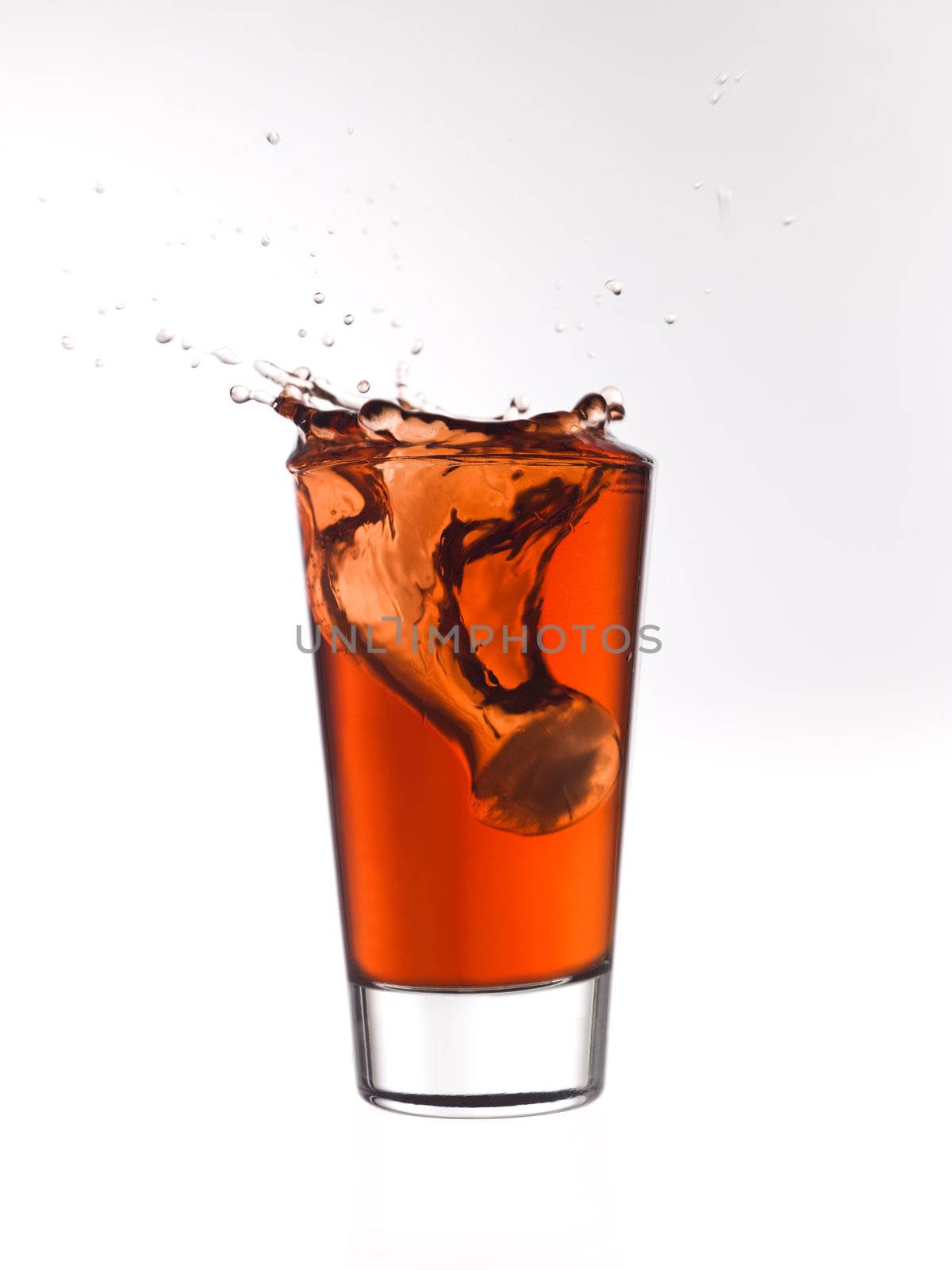Splash in a glass of red lemonade