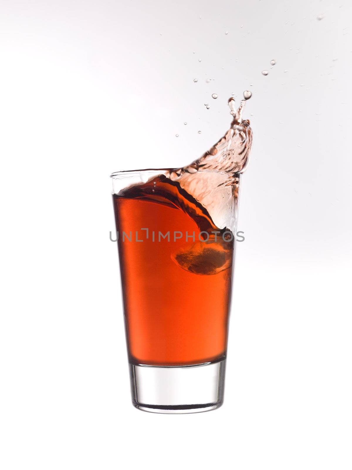 Splash in a glass of red lemonade