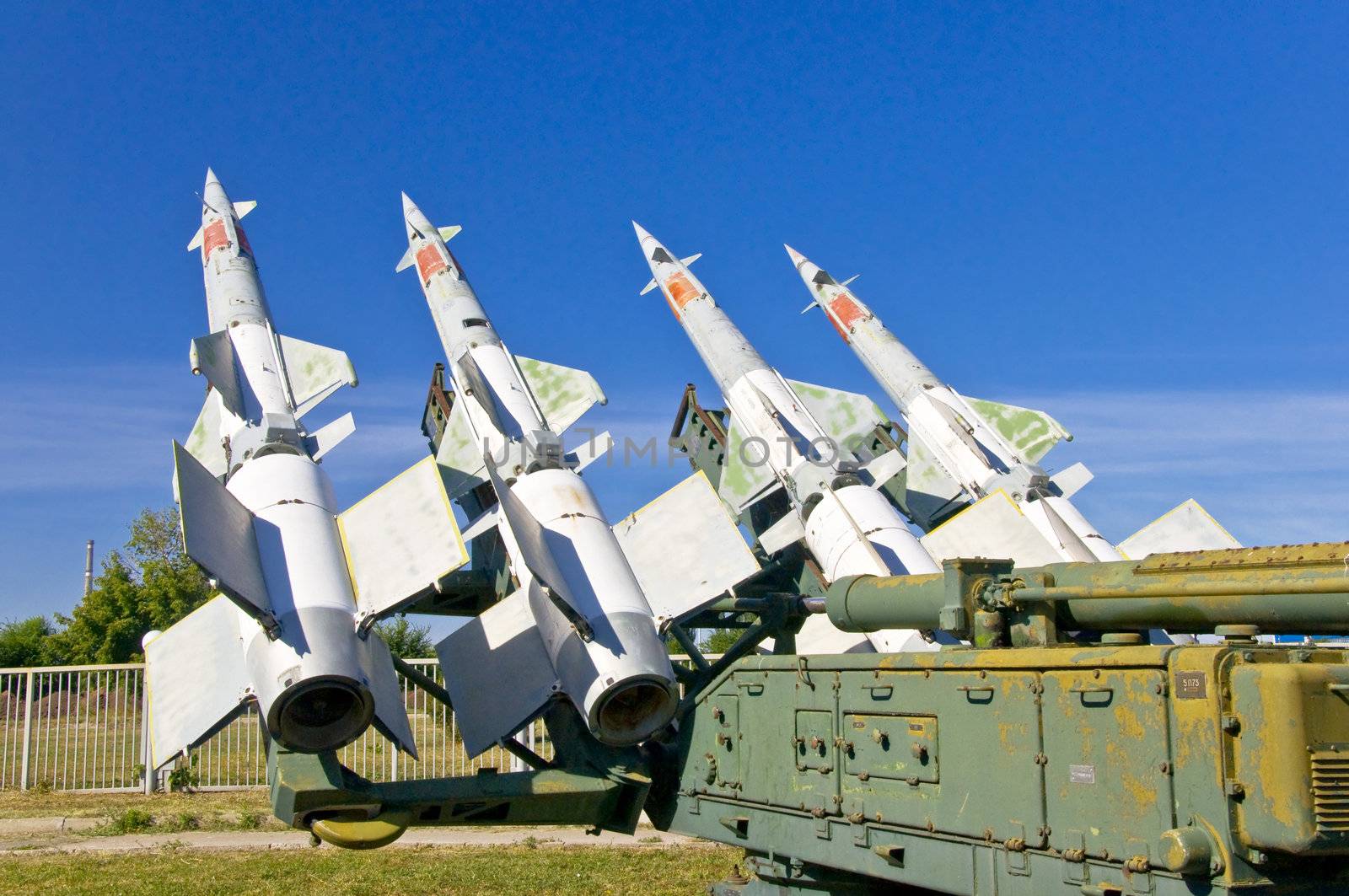 Antiaircraft rockets on the launcher against blue sky.