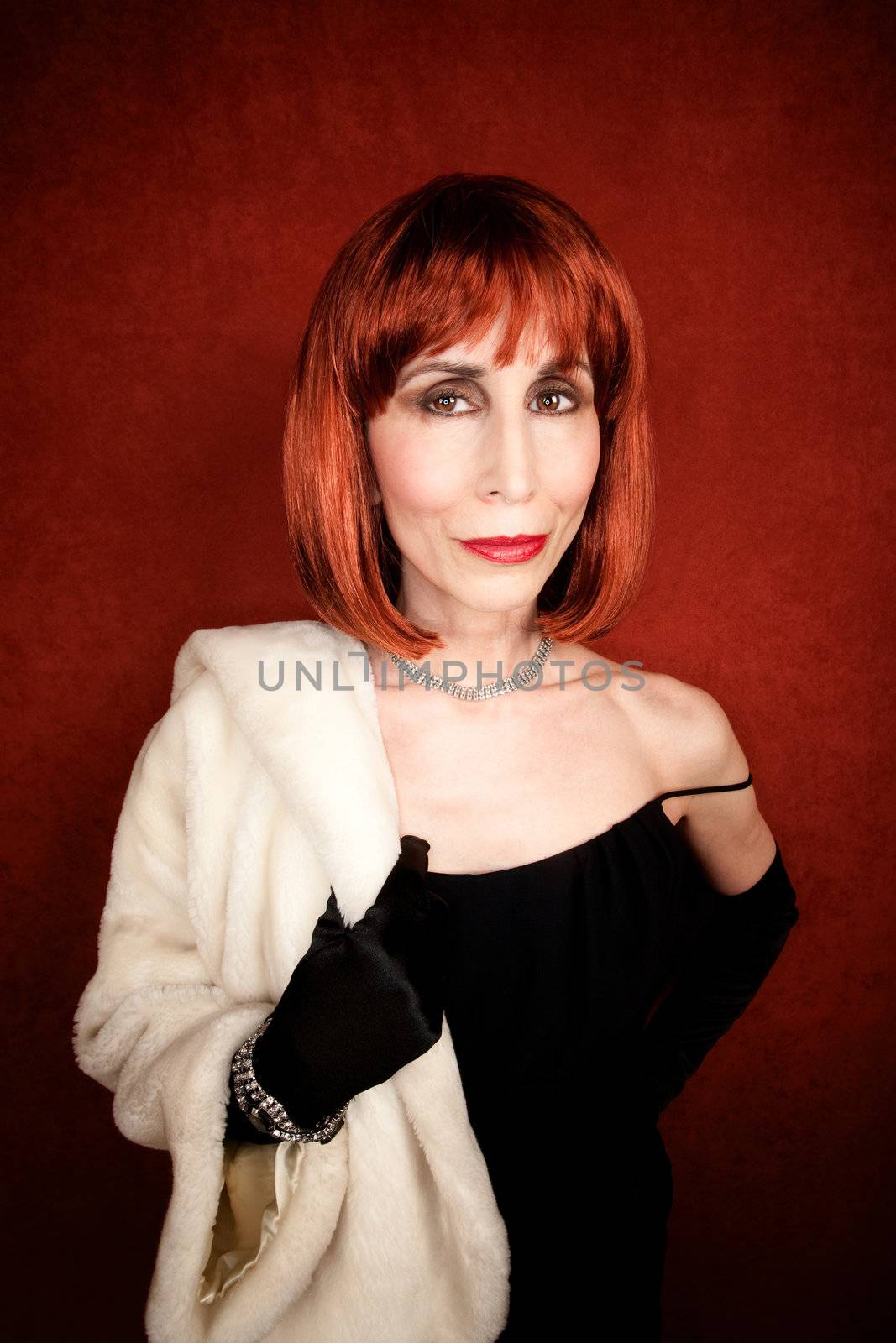 Socilalite with fur coat and brassy red hair