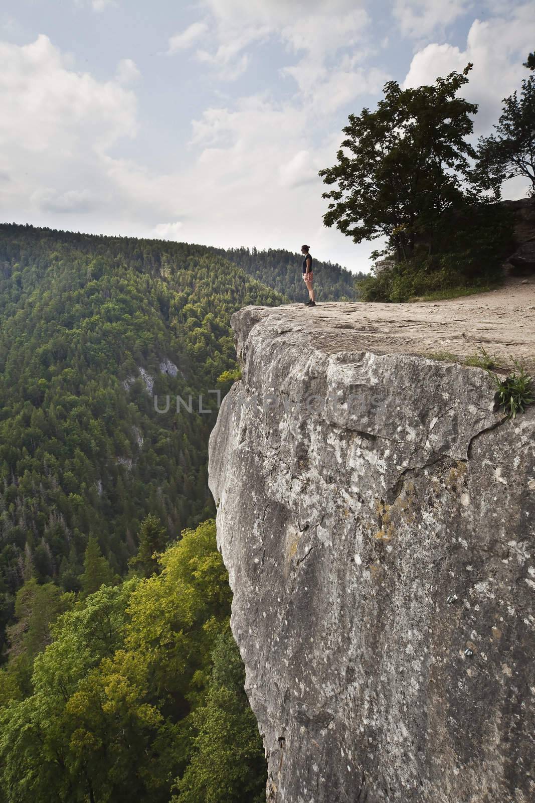 woman standing on big rock by furzyk73