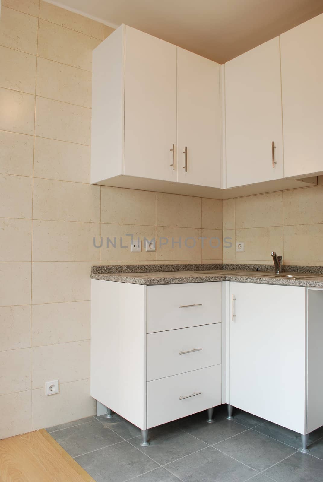 modern and small kitchen in white (wooden floor)