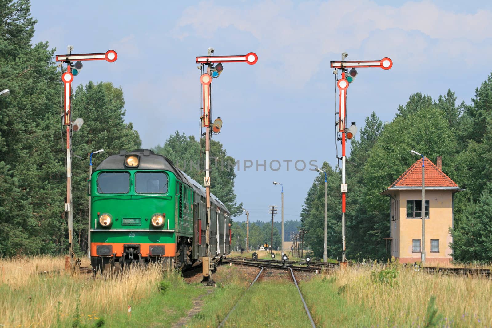 Passenger train entering the station
