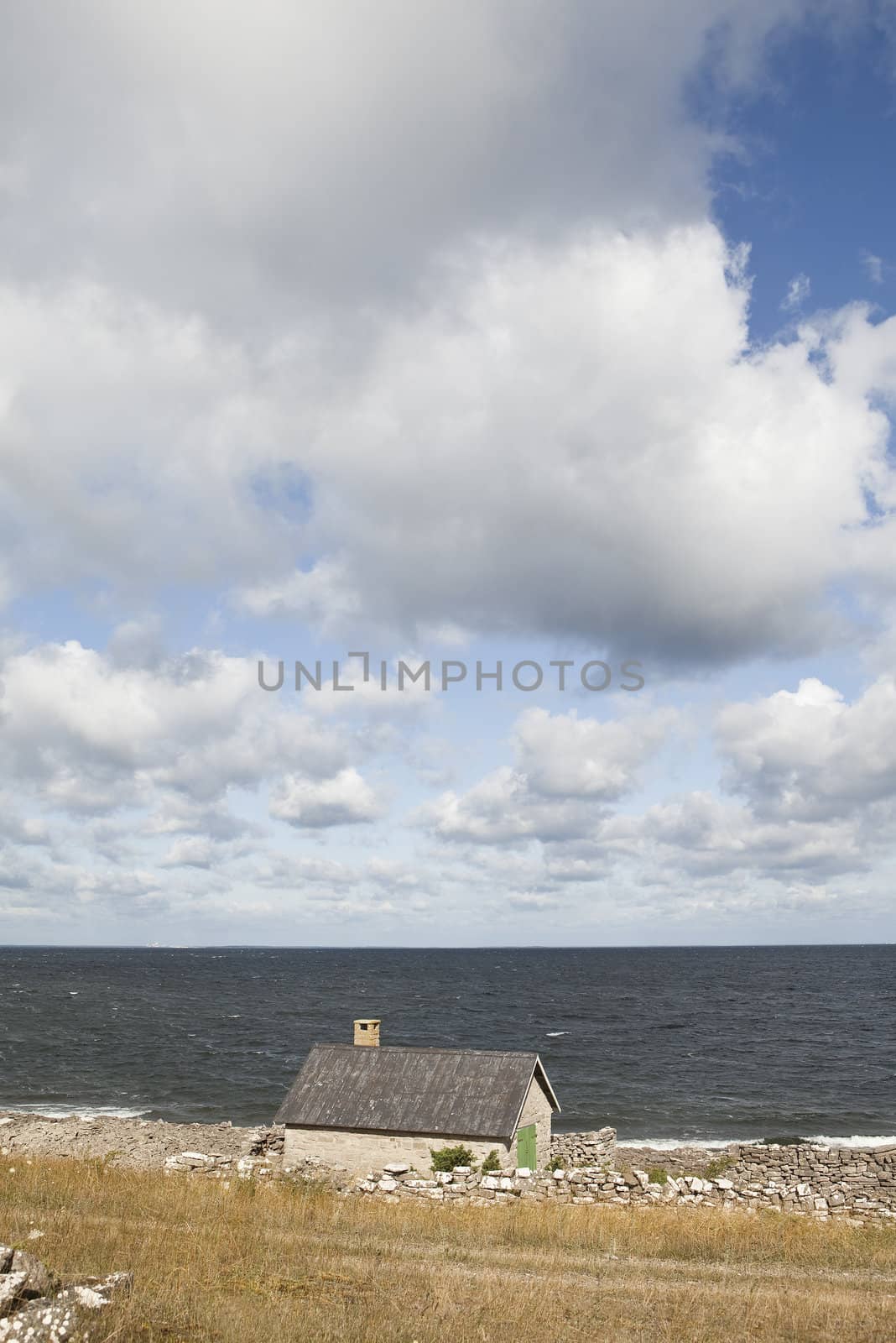 Old farmhouse by the water