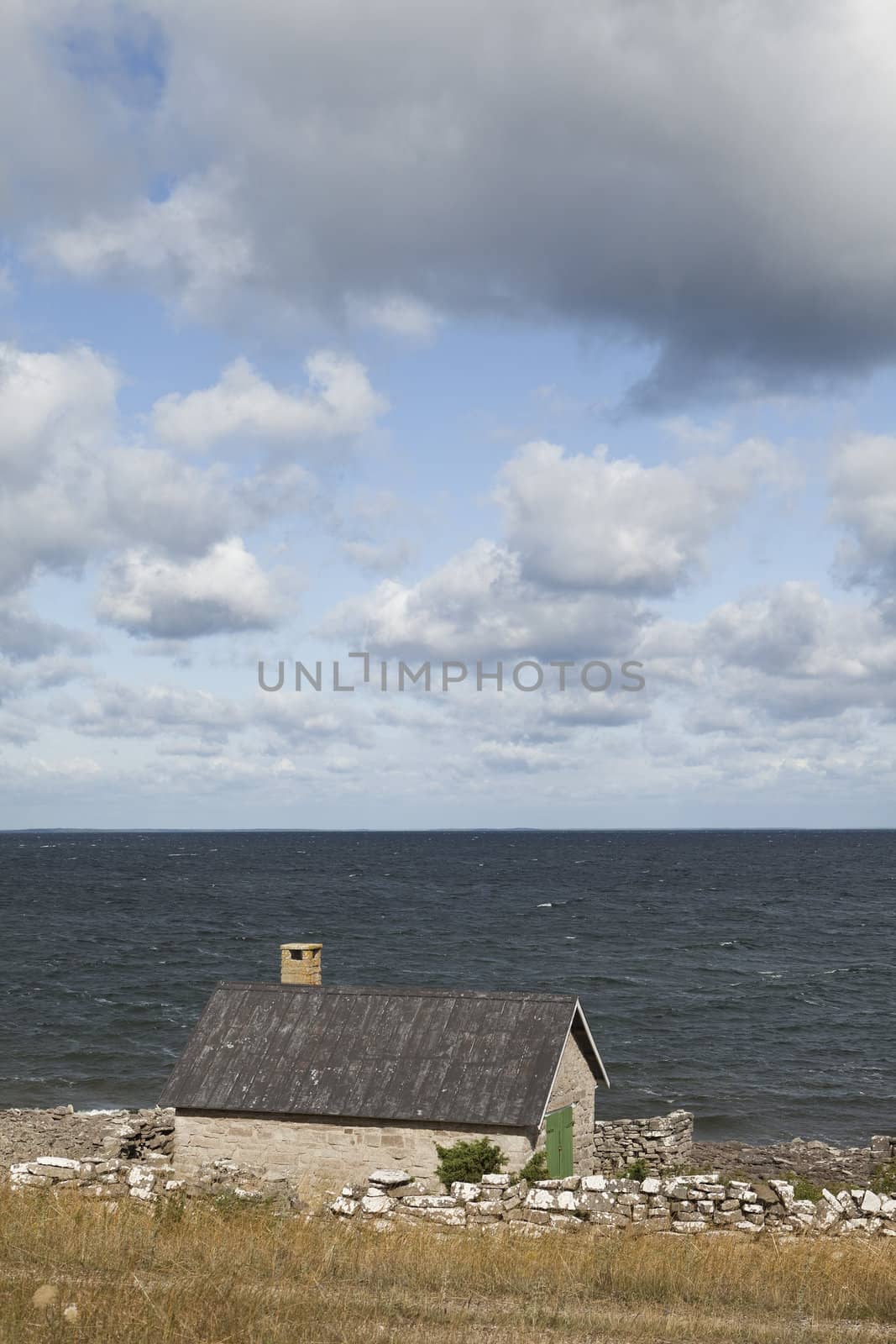Old farmhouse by the water
