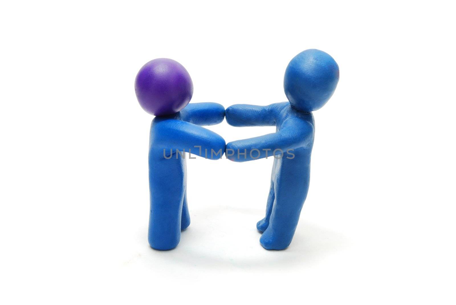 Two 3D Persons of Plasticine Standing Holding Hands in Hands Isolated on White Background