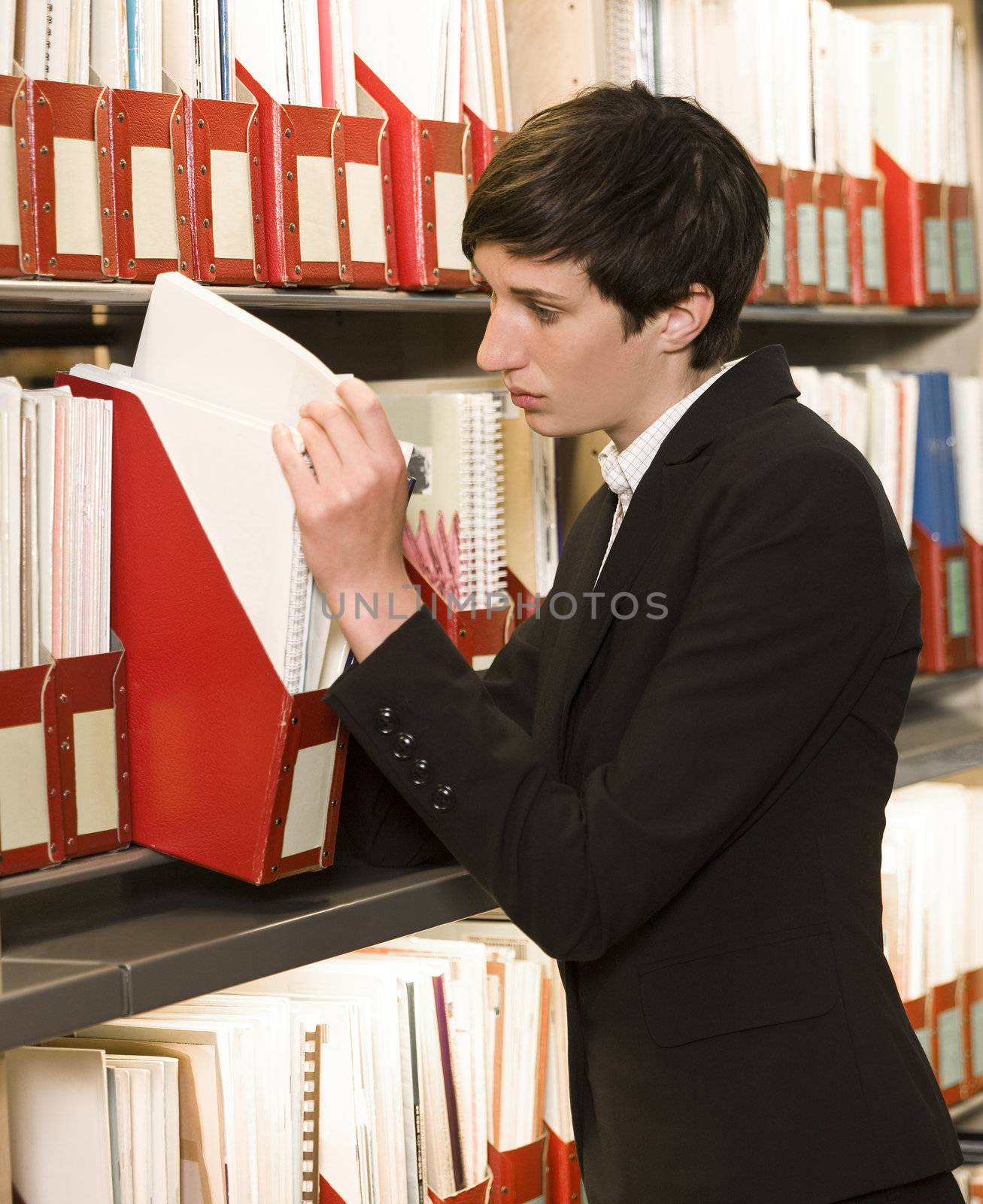 Woman searching at an archive