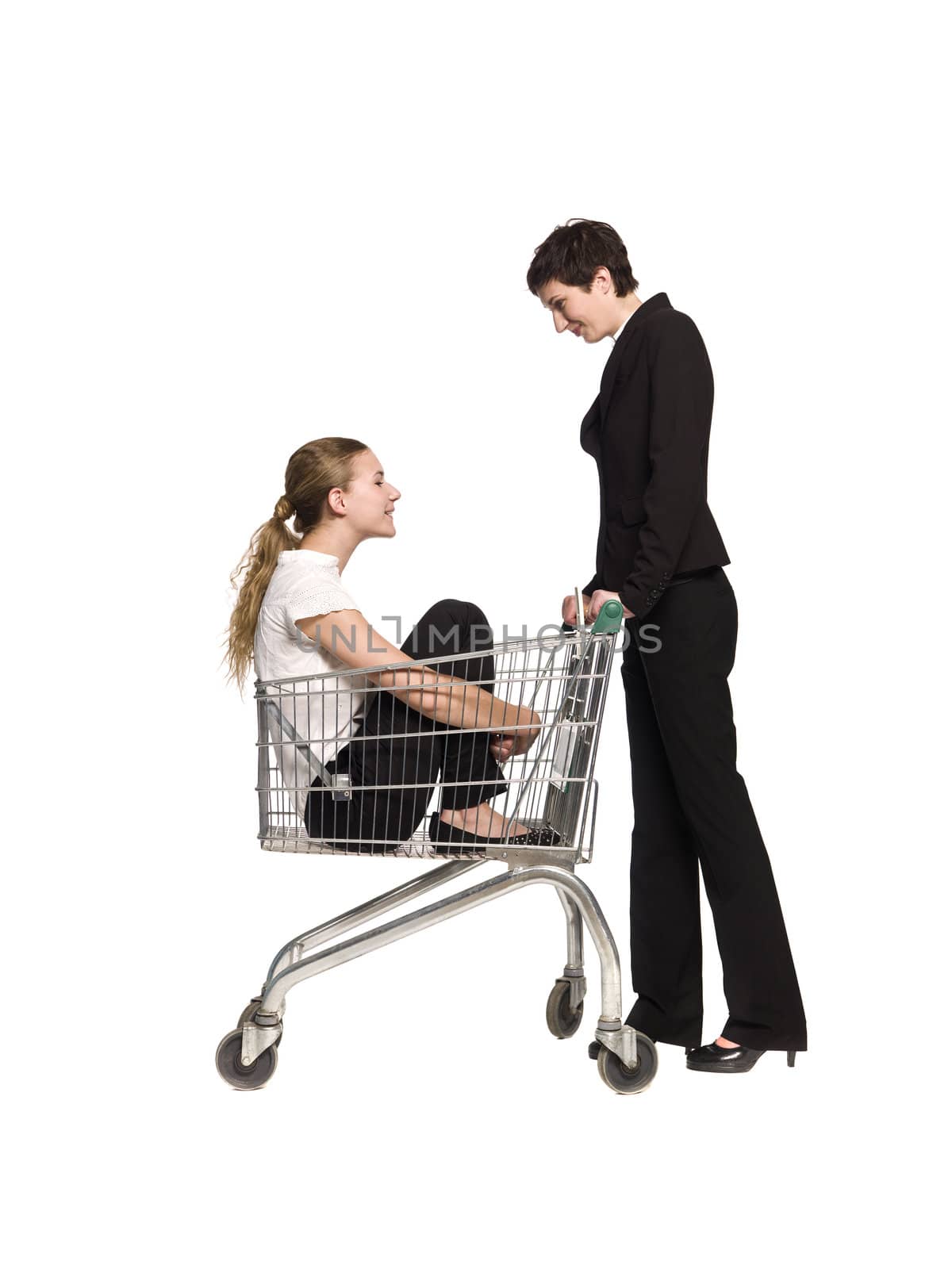 Woman with her friend in a shopping cart by gemenacom