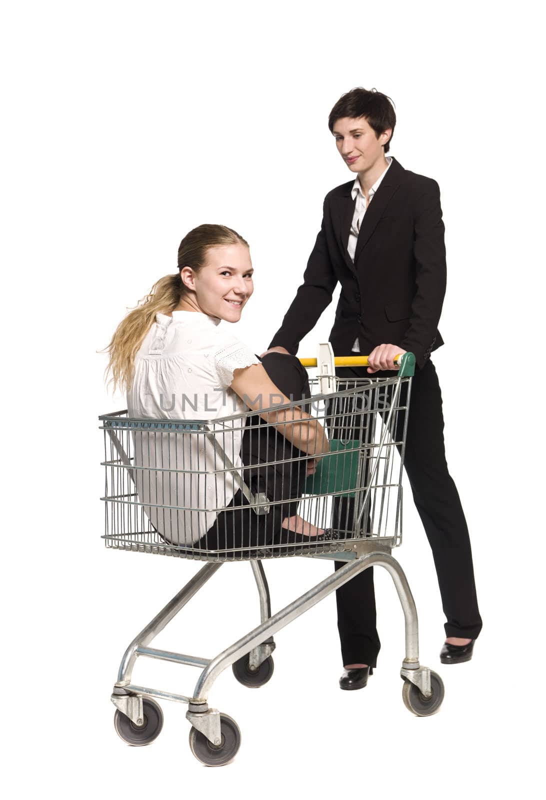 Woman with her friend in a shopping cart by gemenacom