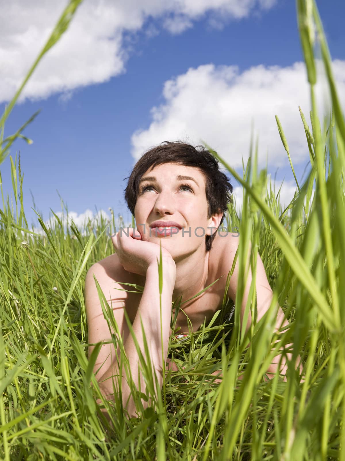 Woman lying in the grass