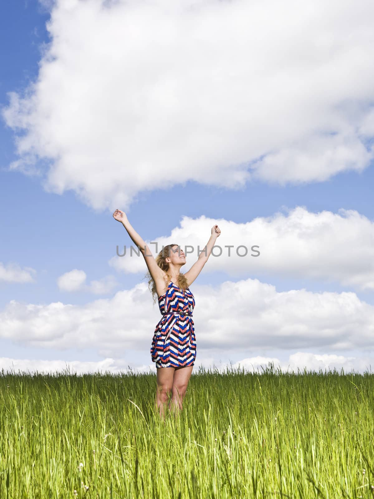 Young woman standing on a field