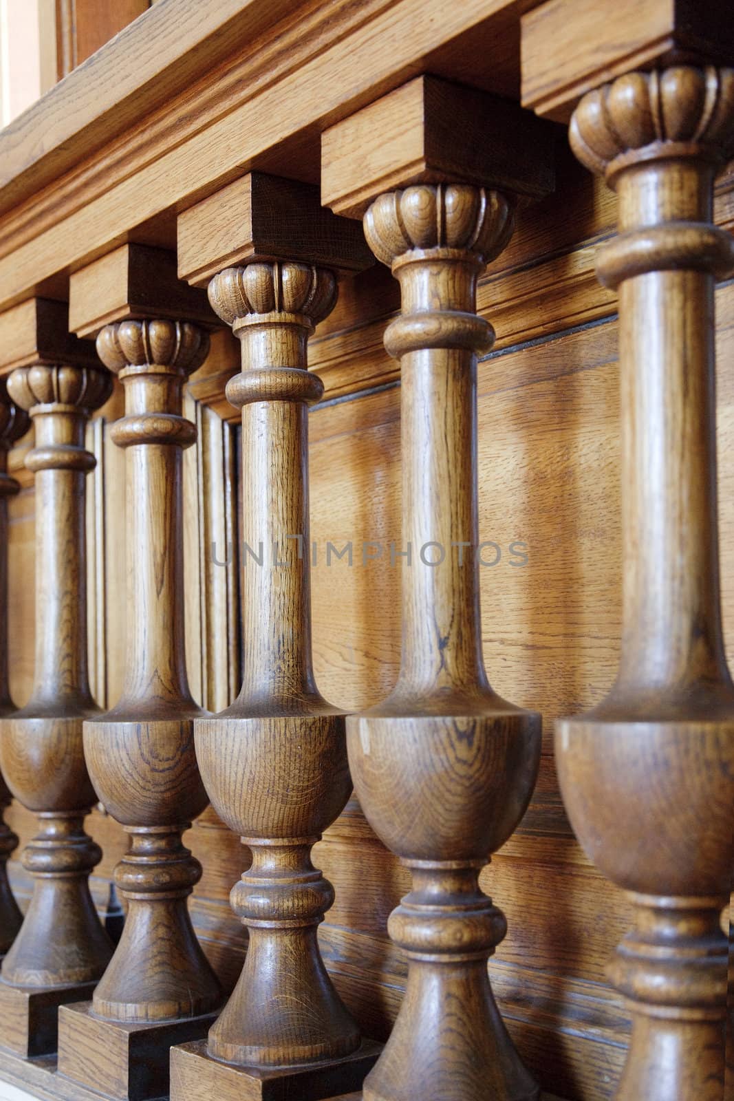 Closeup photo of balusters of a staircase in a historical public library.