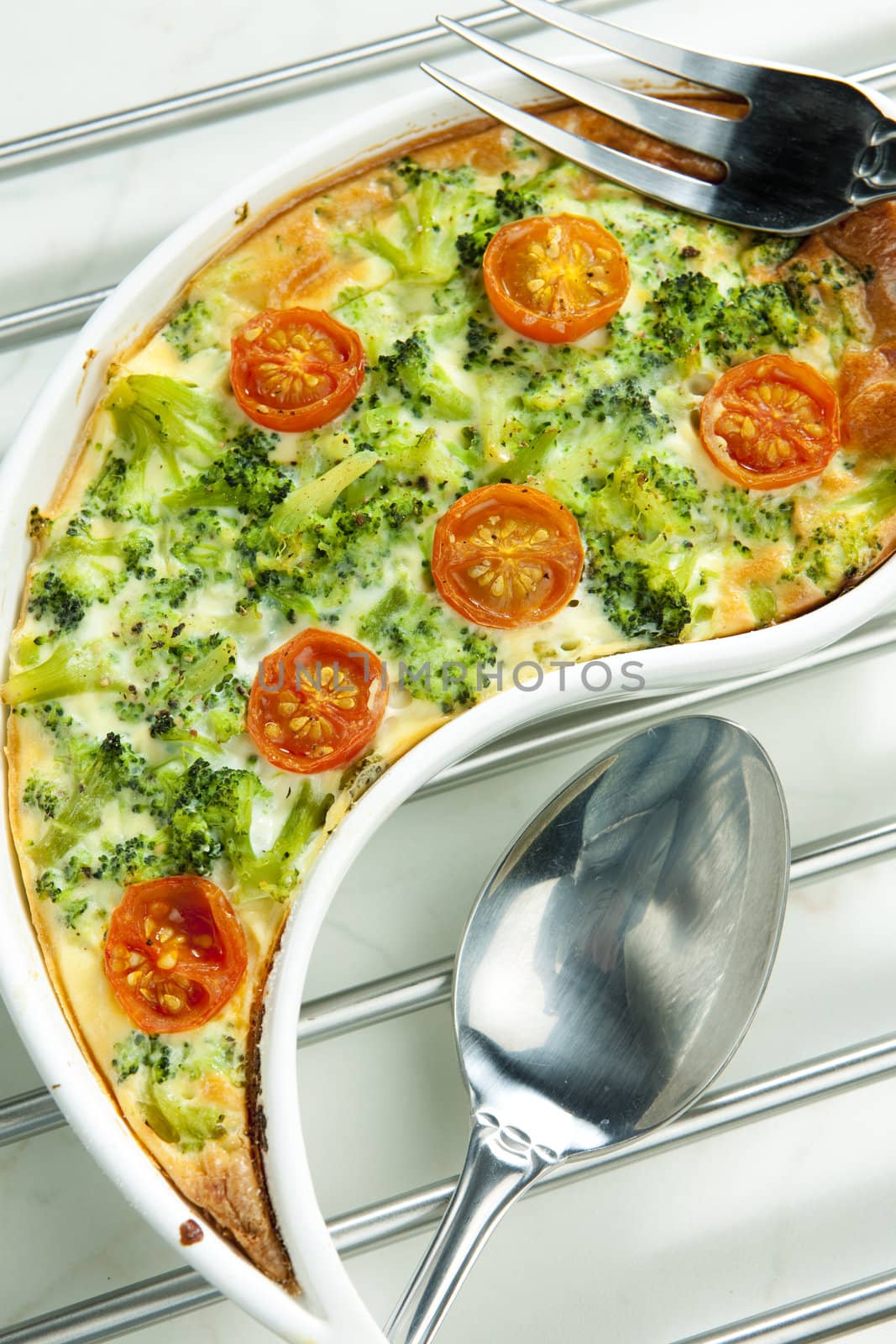 cake with broccoli and cherry tomatoes
