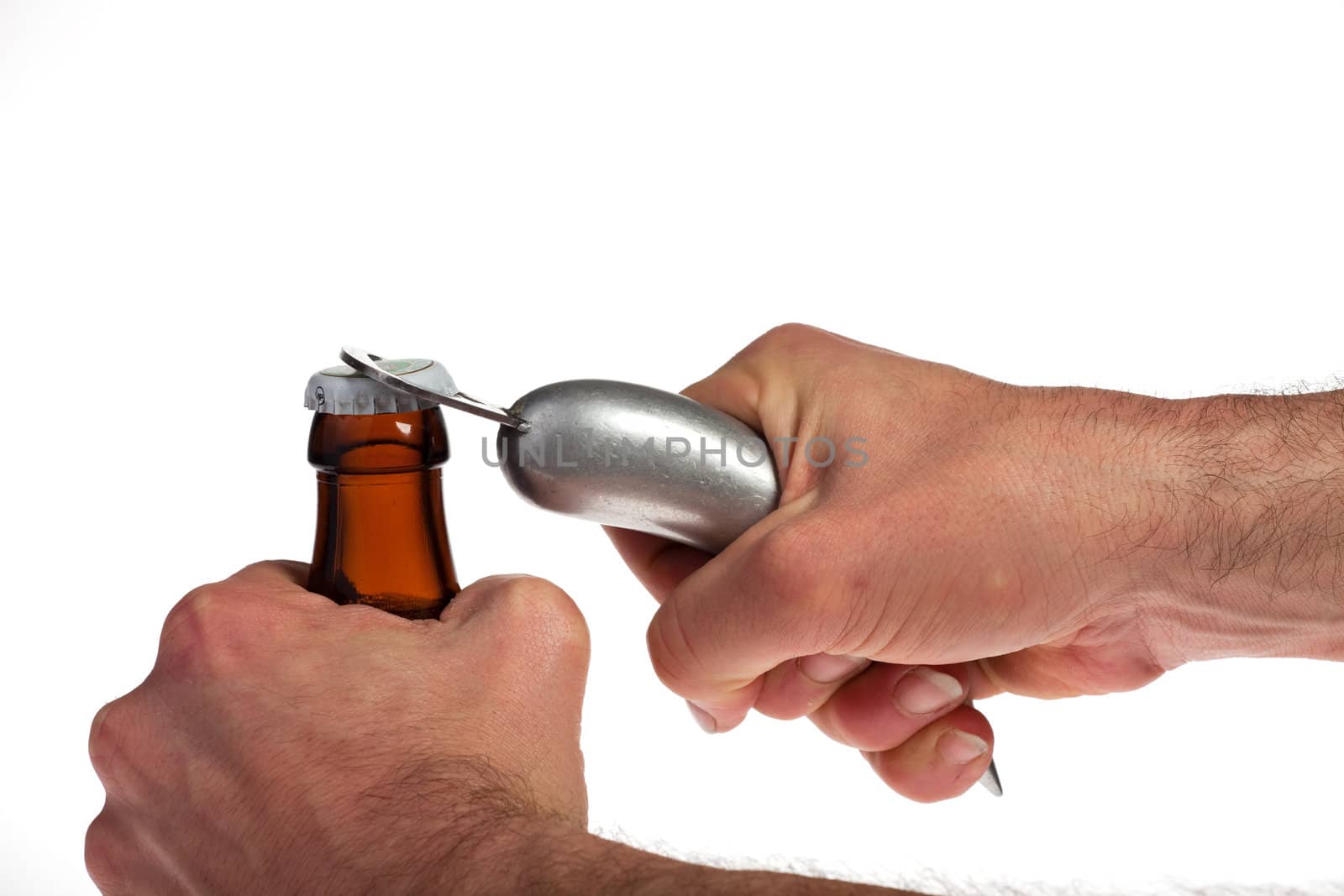 Hands opening a beer bottle on a white background