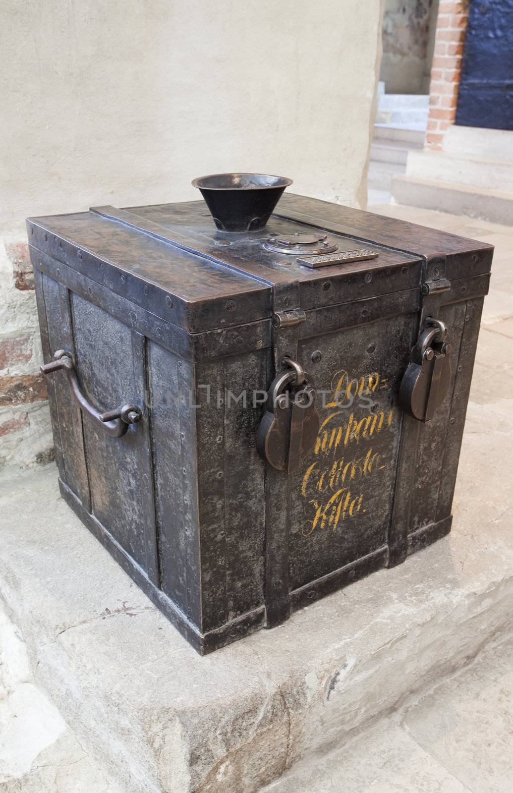 Donations collecting box in a Medieval Cathedral. Turku, Finland.