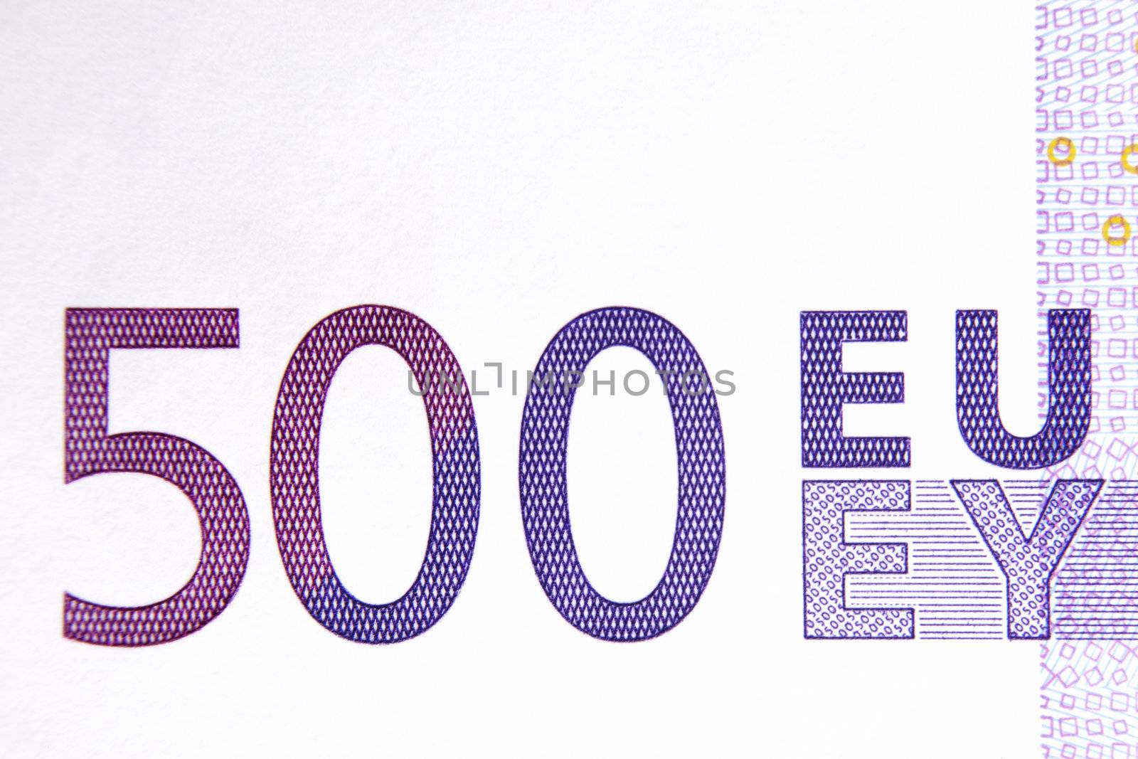 Closeup photo of a part of five hundred euro note including. Macro photo.