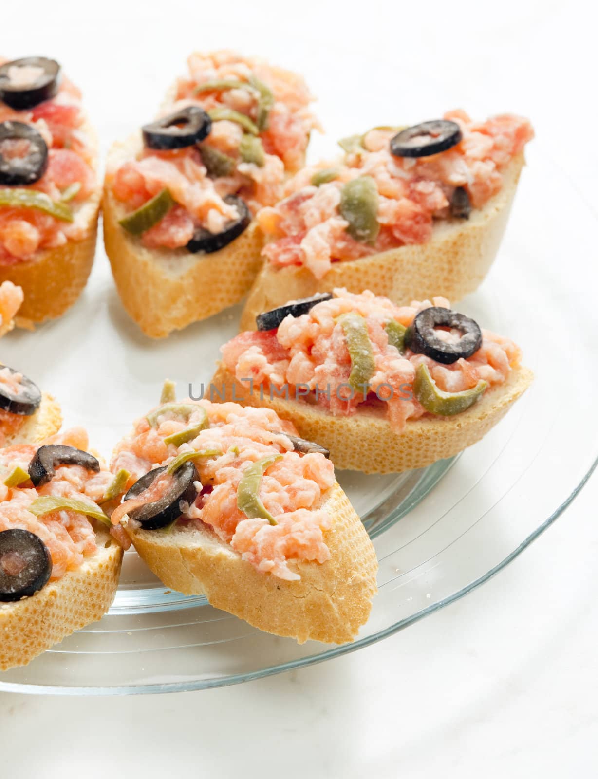 salmon tartare with capers and black olives