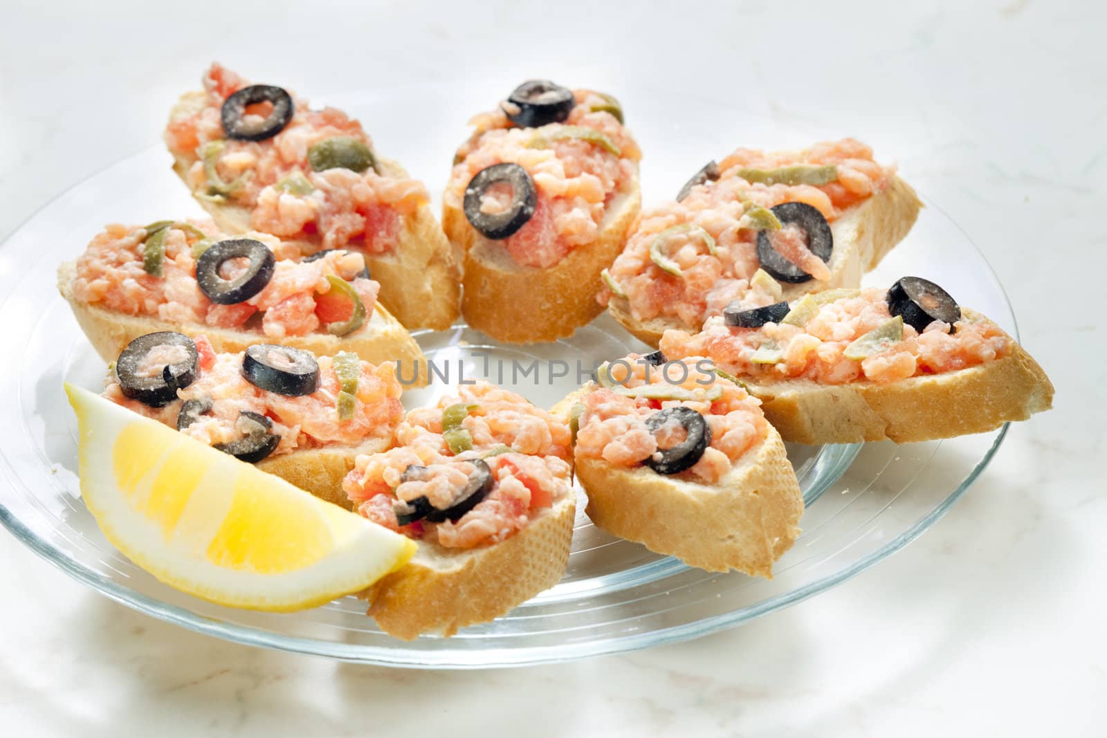 salmon tartare with capers and black olives