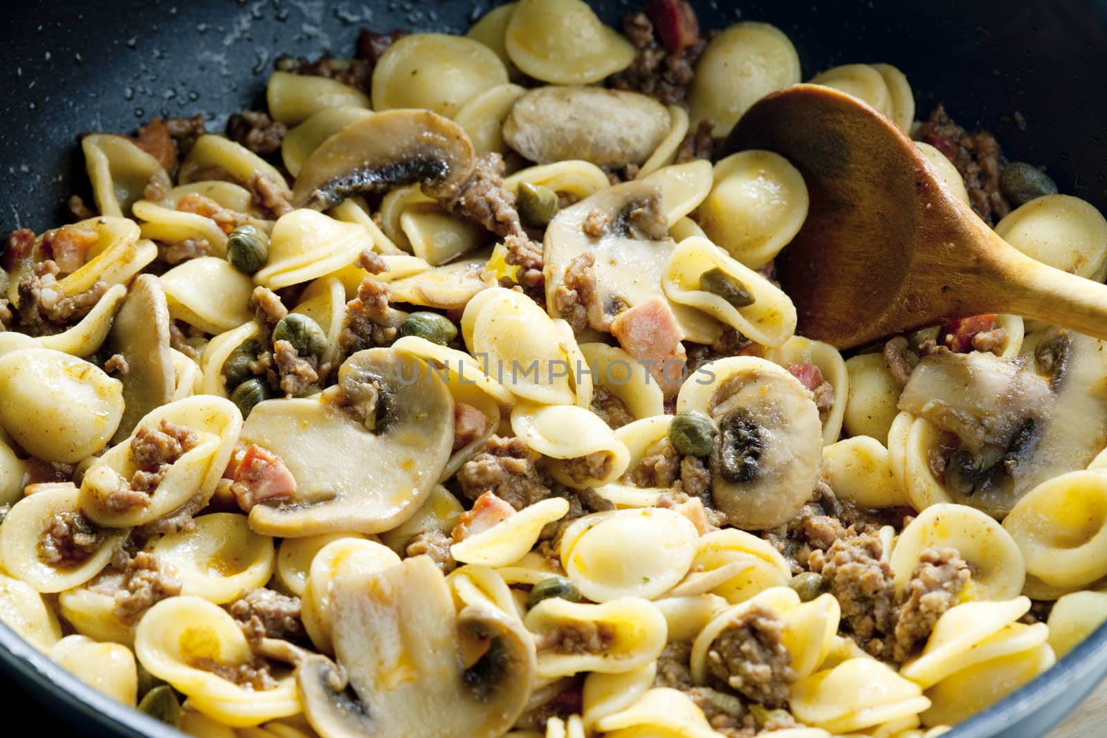 pasta orecchiette with bacon and champignons