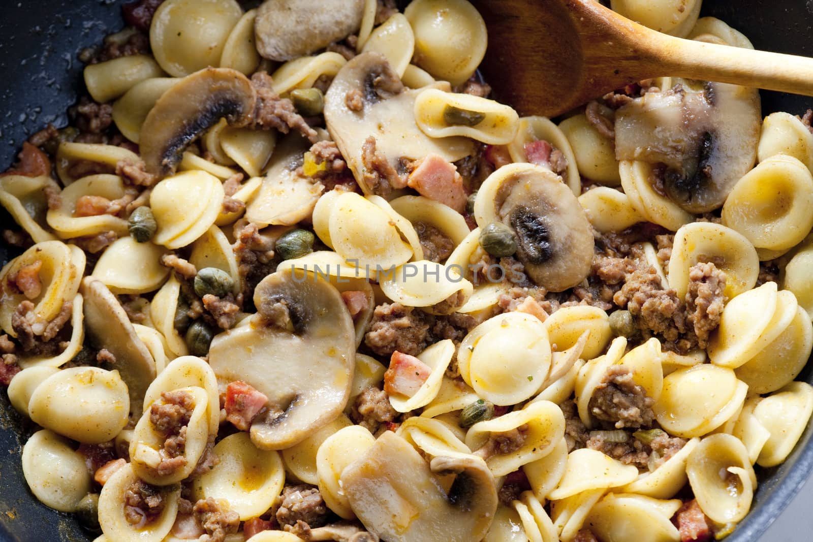 pasta orecchiette with bacon and champignons