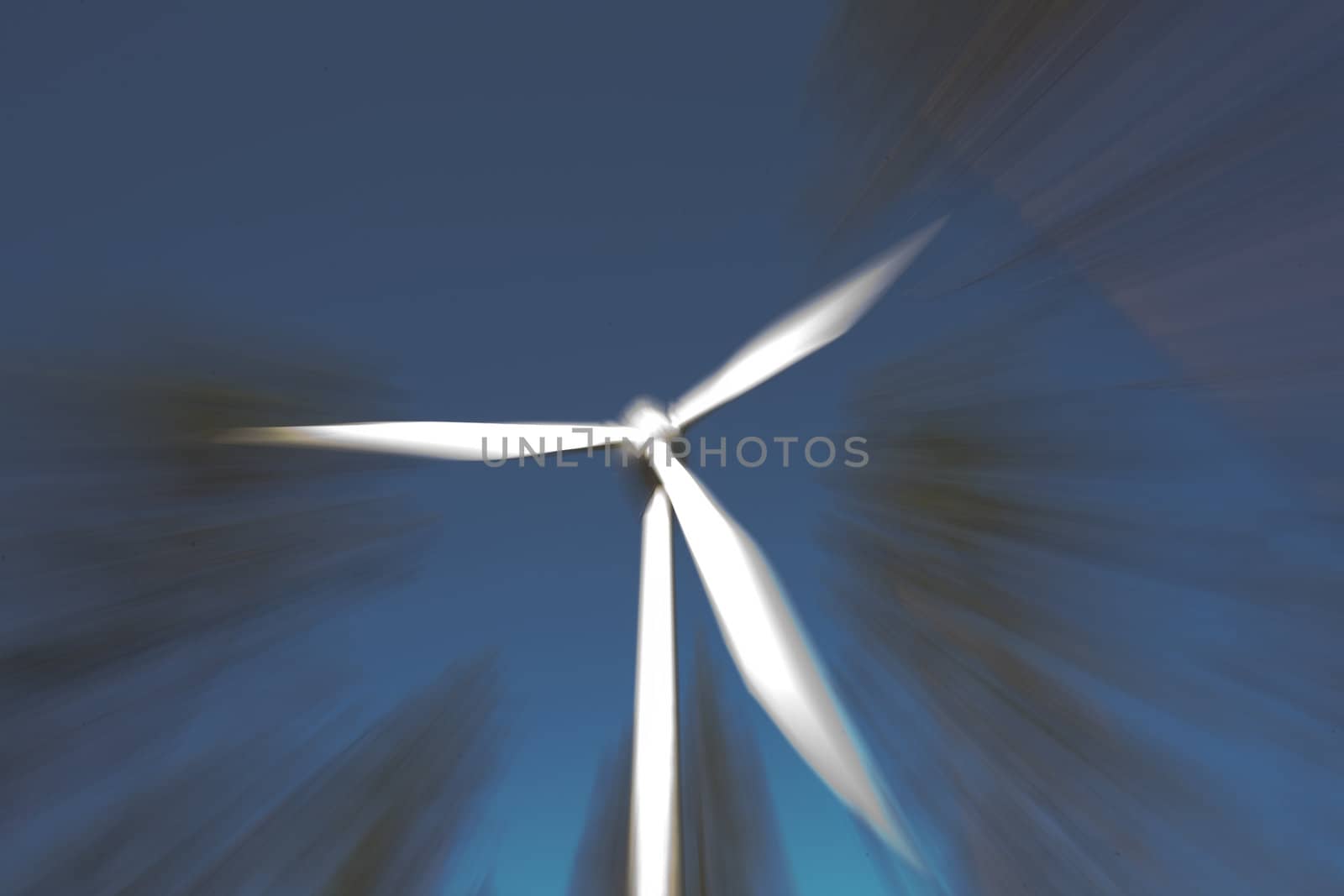 Modern windmill producing renewable energy ecologically.