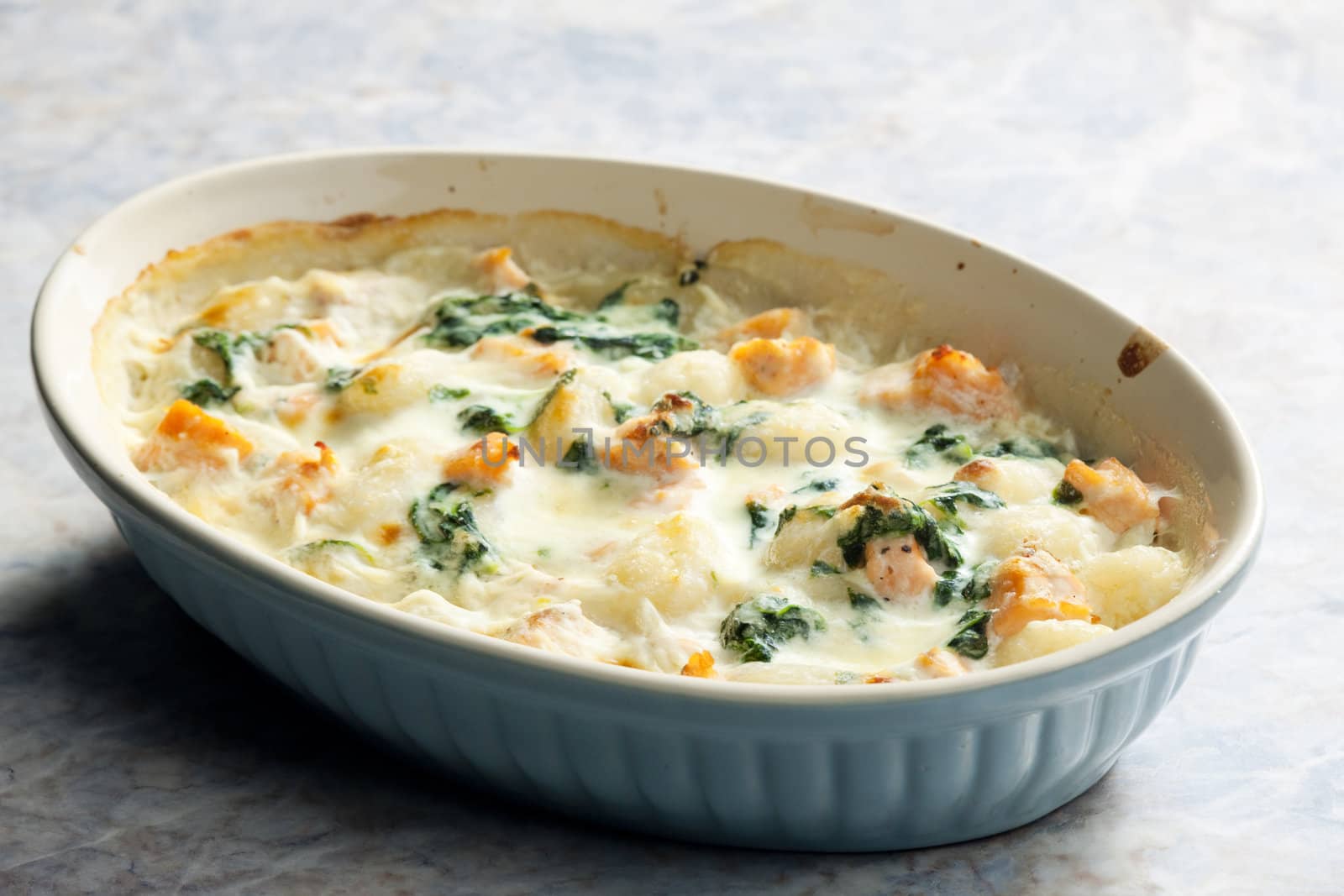baked gnocchi with salmon and spinach
