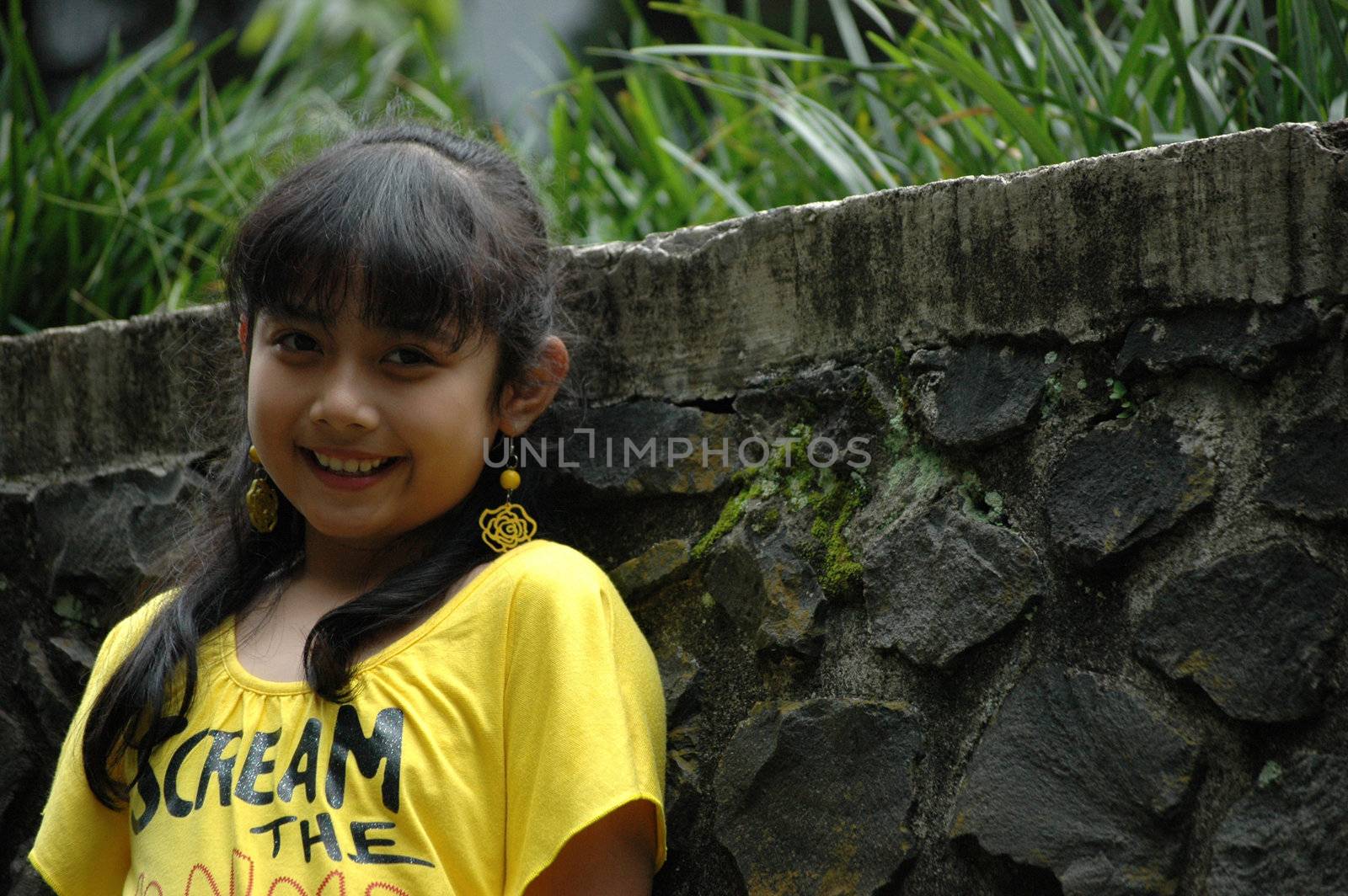 little asian girl with nice smile expression