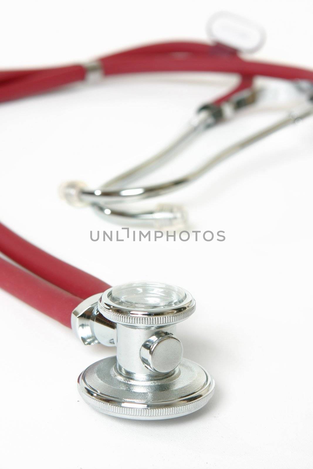Sprague stethoscope, chrome chestpeice, separate sound channels for each ear, 
 interchangeable bells.   Focus on chestpiece.