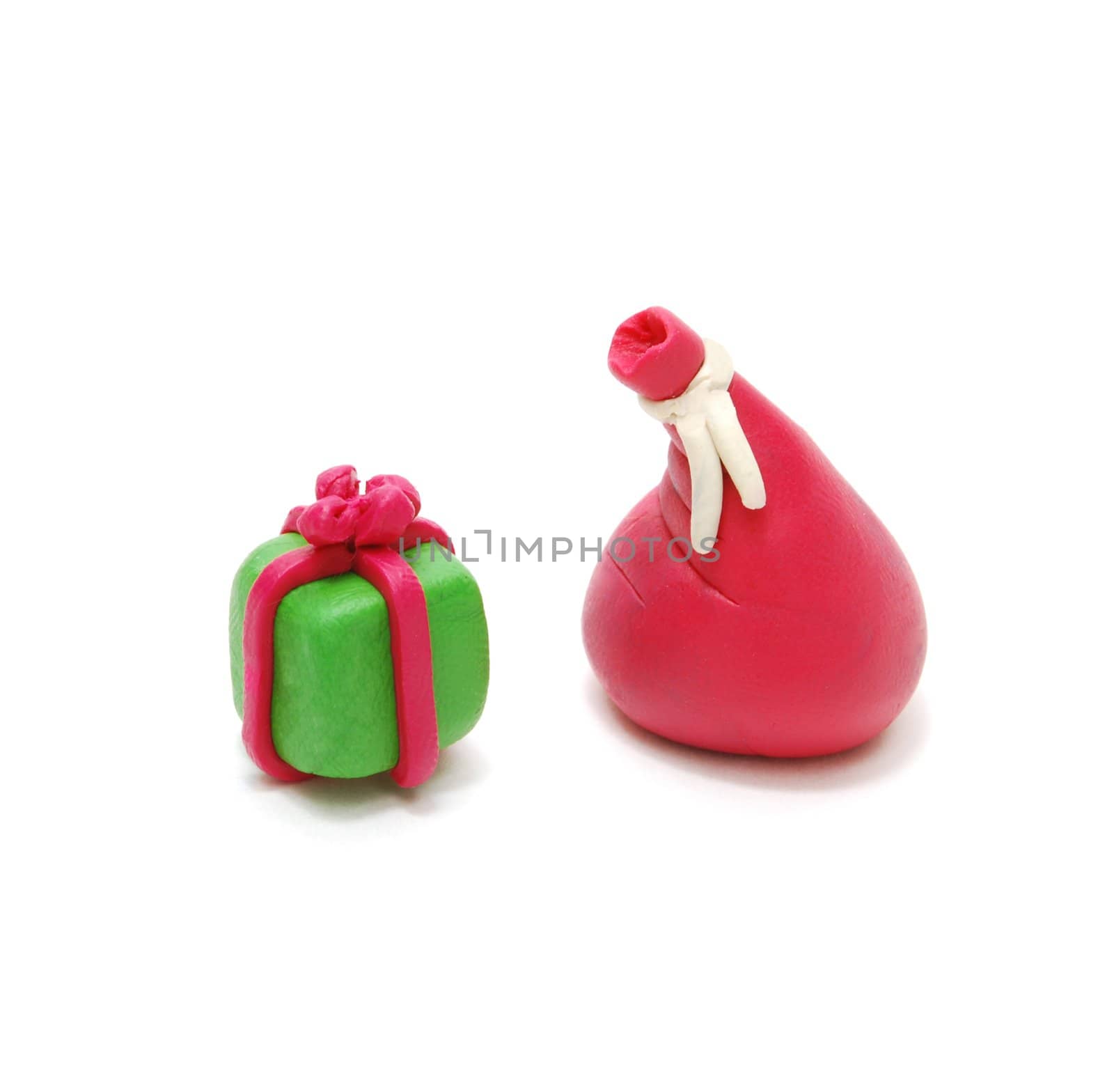 3D Christmas Gift and Red Santa's Sack Made of Plasticine Isolated on White Background