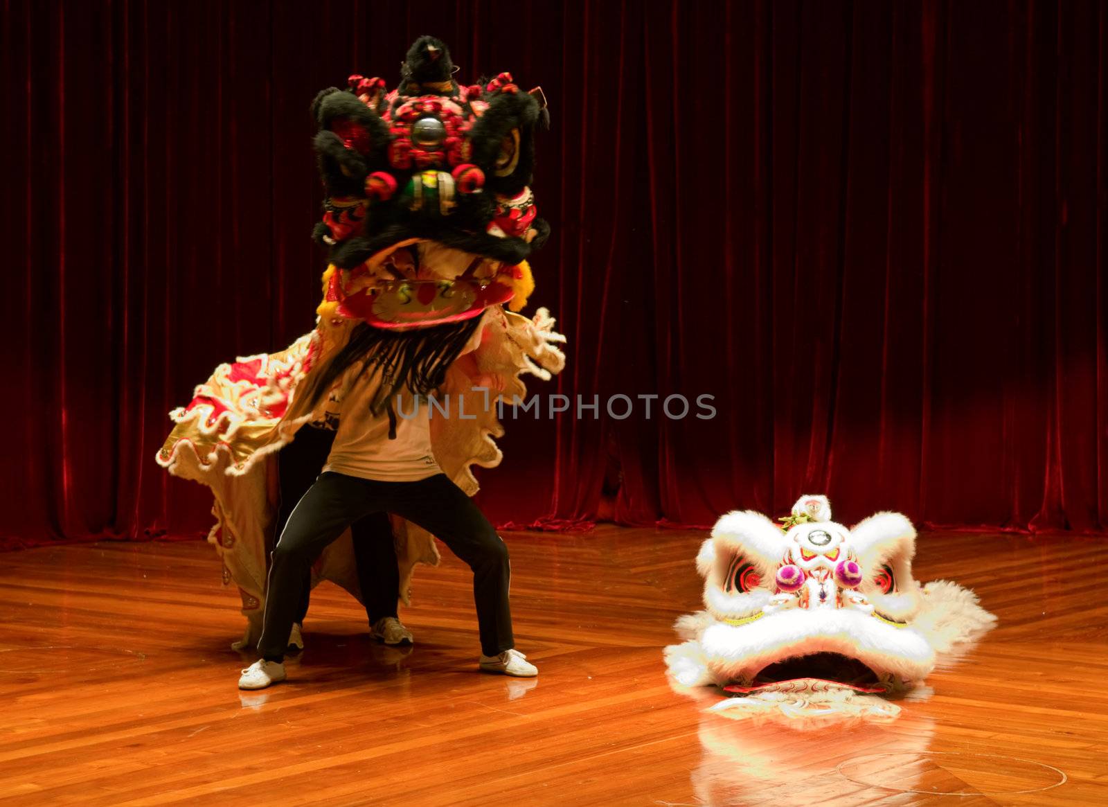 The traditional Chinese lion dance on stage