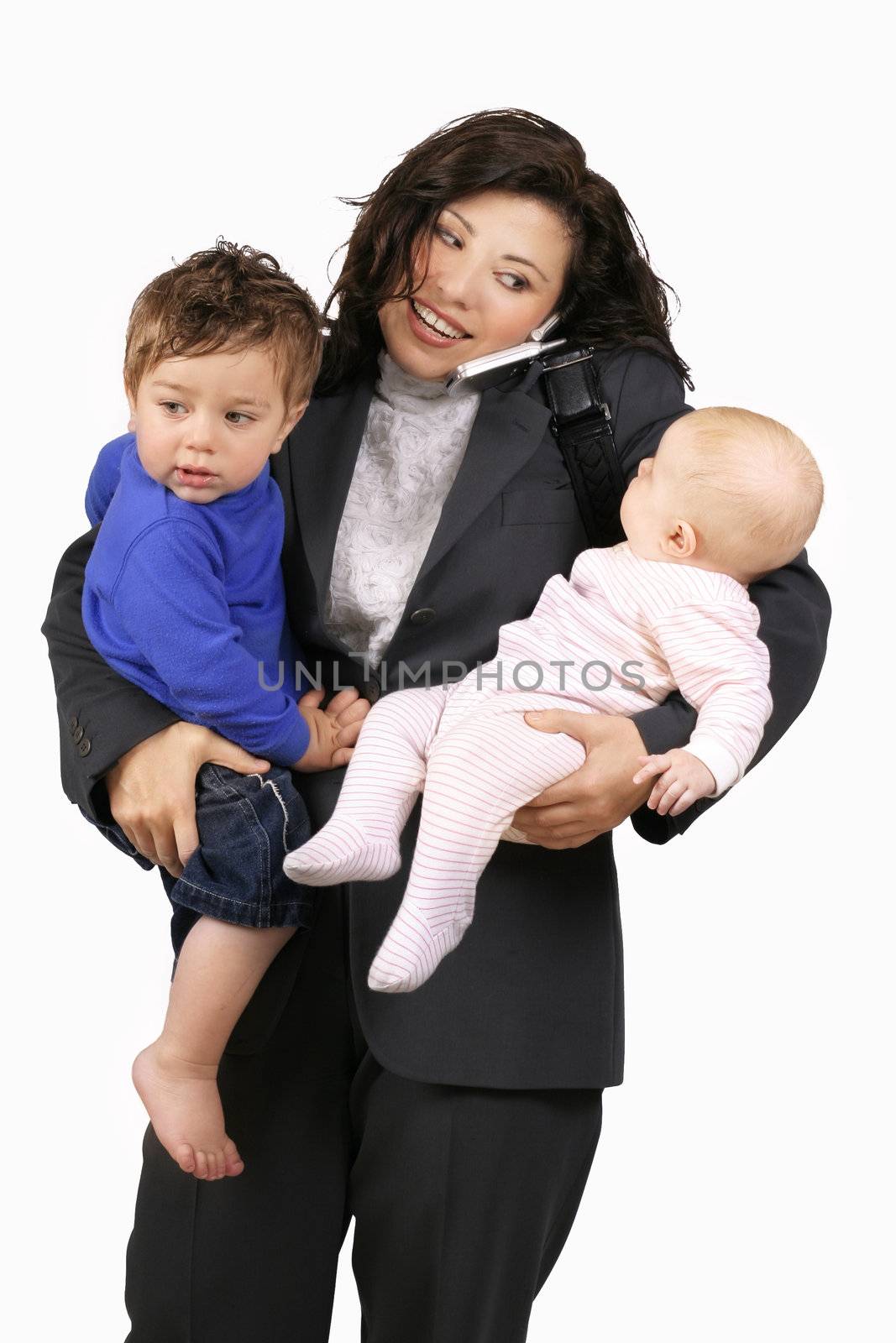 A career woman busy with toddler, baby and telephone