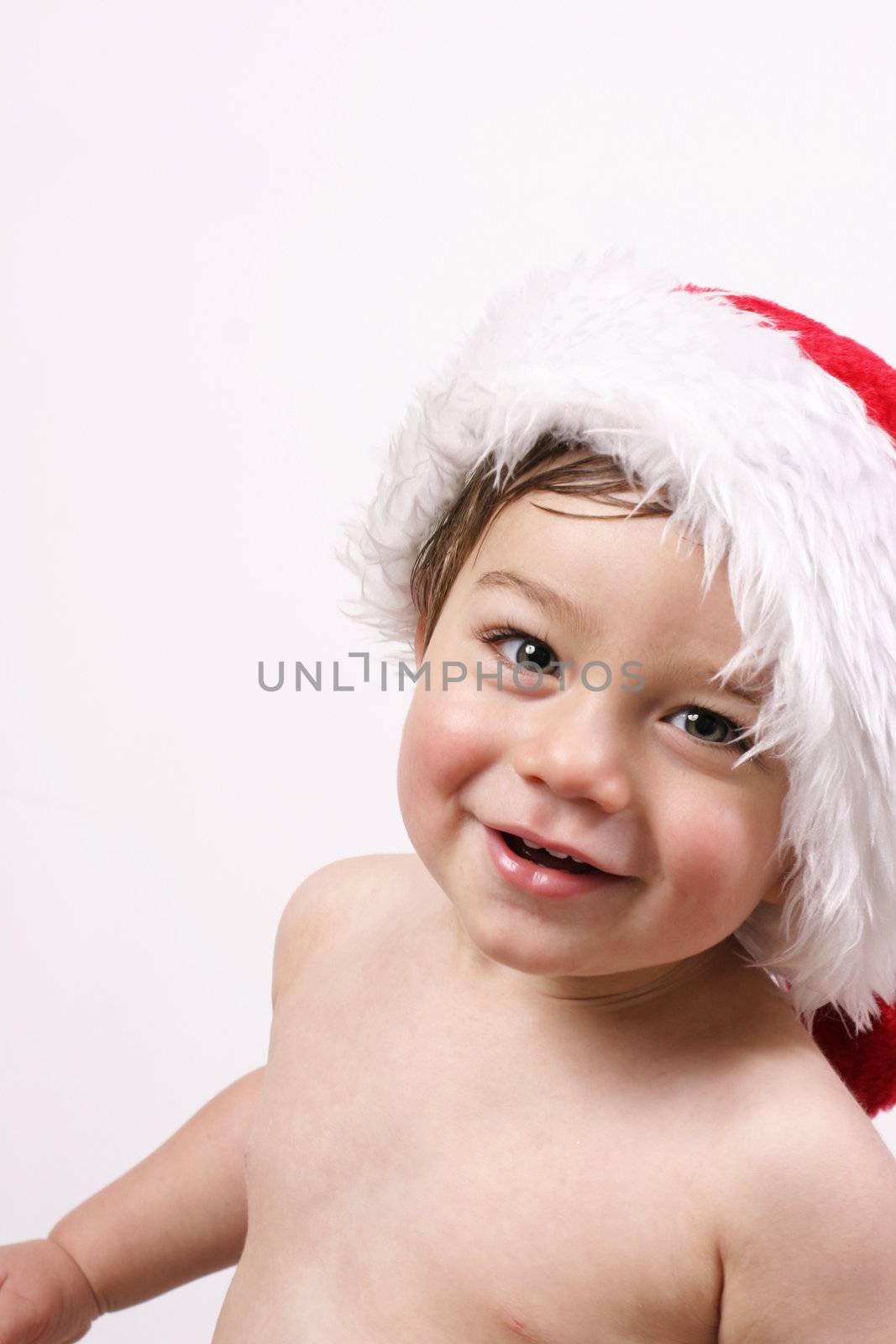 Ho Ho Ho, Merry Christmas
Beautiful  15 momths old boy in santa hat
