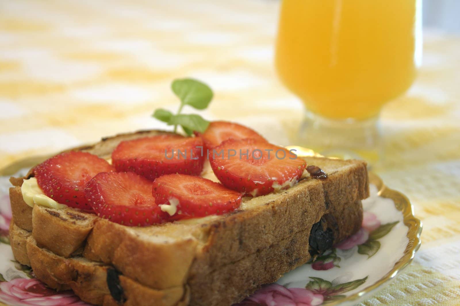 Breakfast toast with fresh strawberries and juice by lovleah