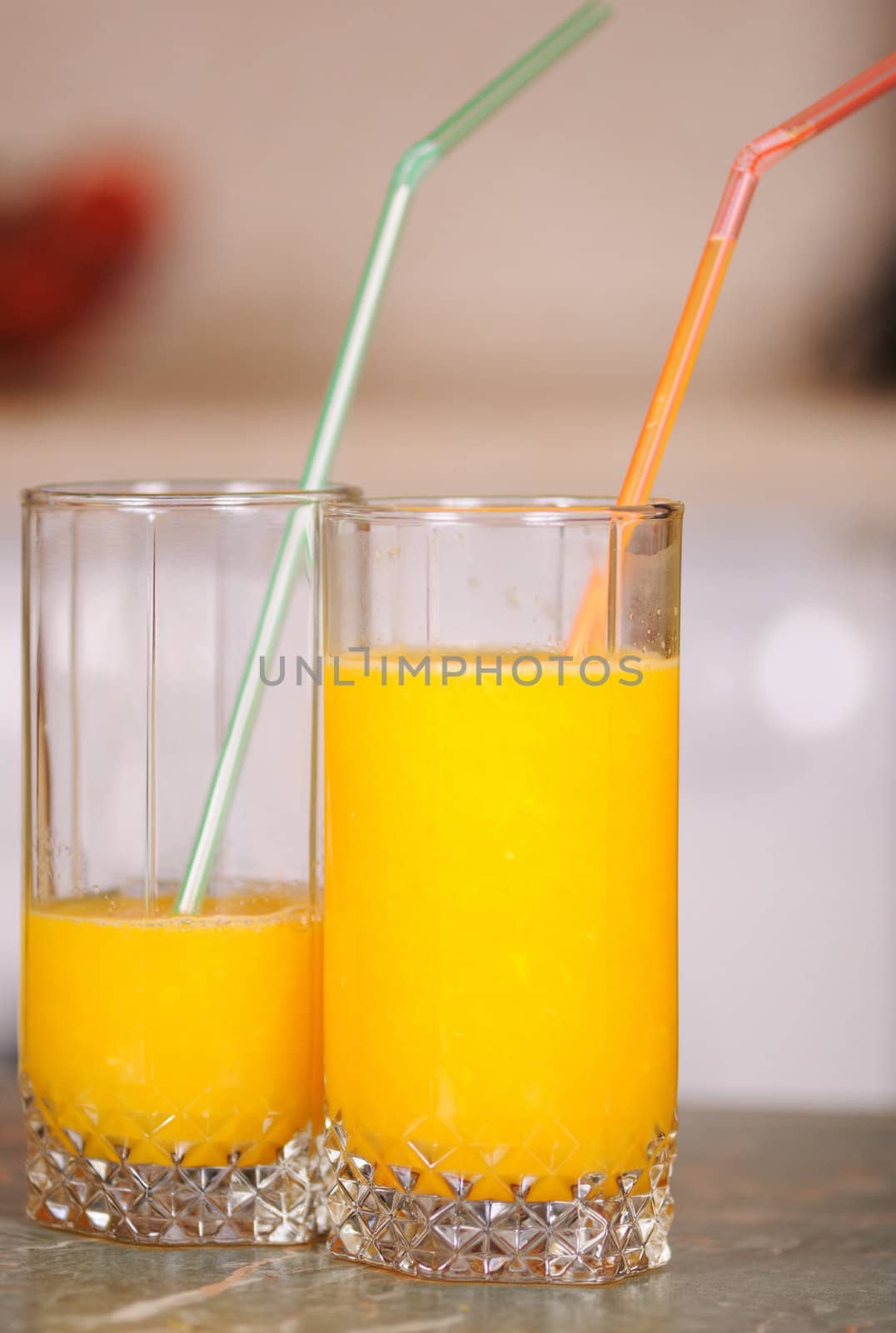 Orange juice in a glass on a table