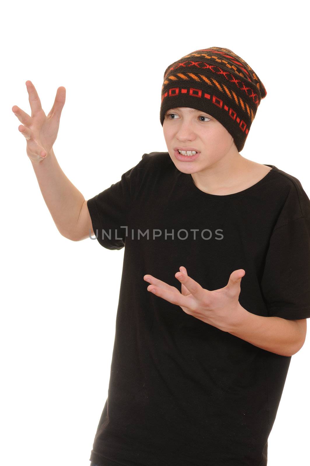 The teenager in a black vest and a hat isolated on white background