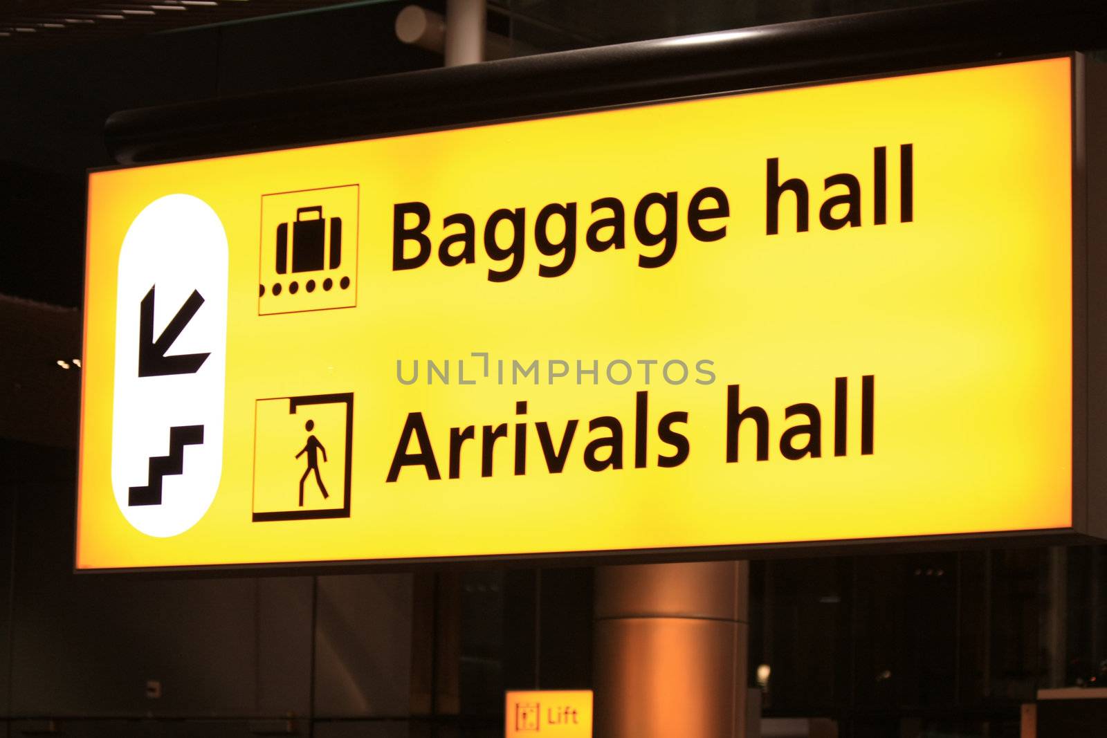 Yellow airport information sign, arrivals and baggage halls