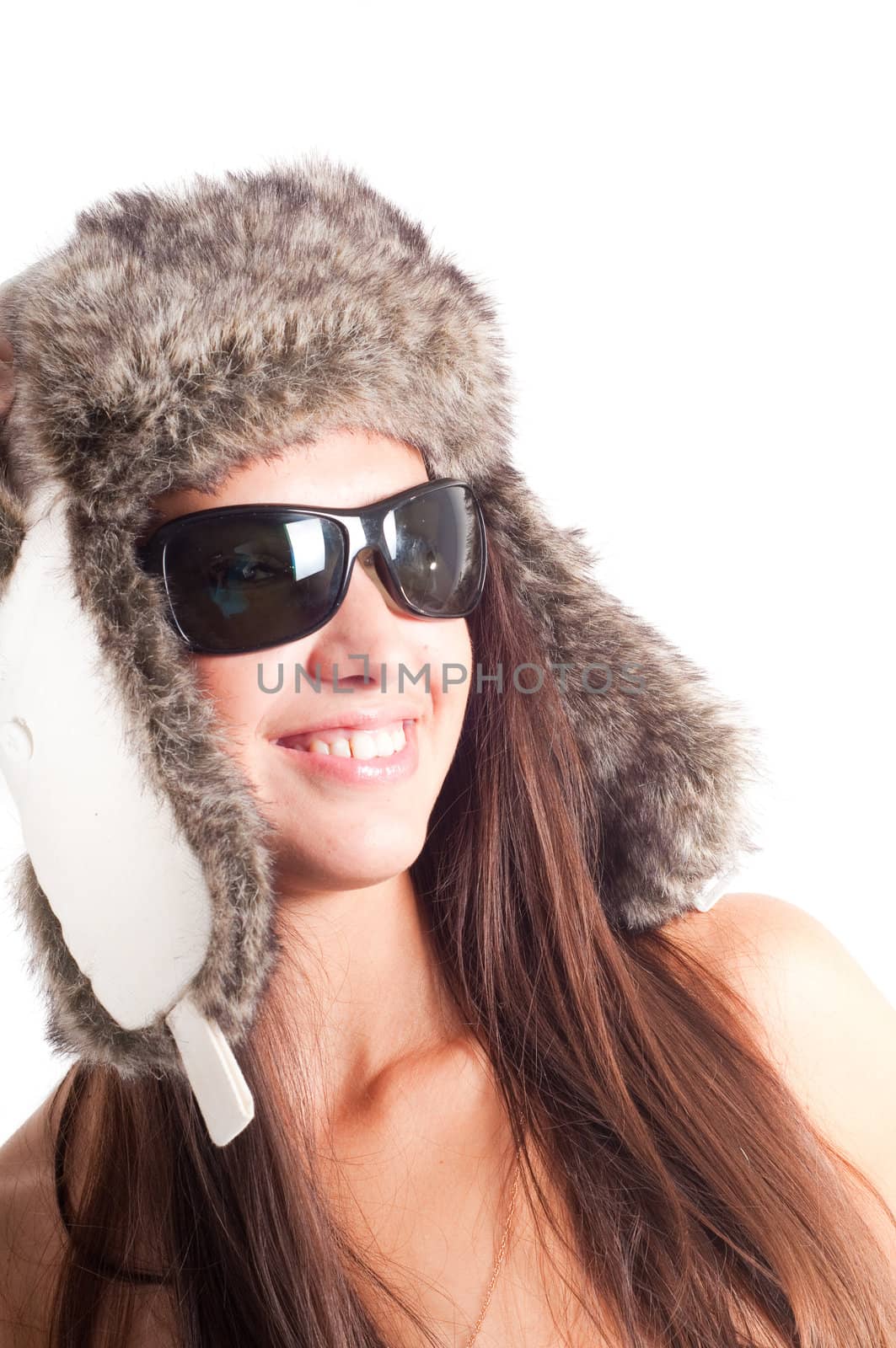 Studio shot of beautiful woman in fur hat