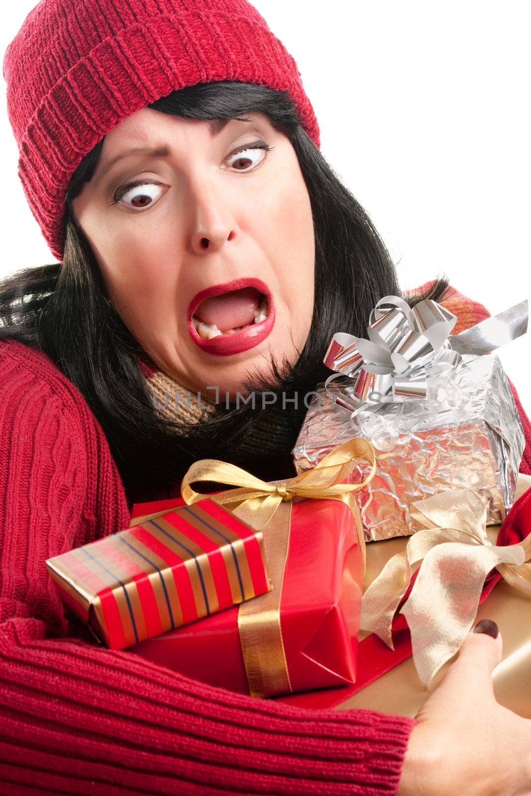 Excited, Attractive Woman Balancing Holiday Gifts Isolated on a White Background.