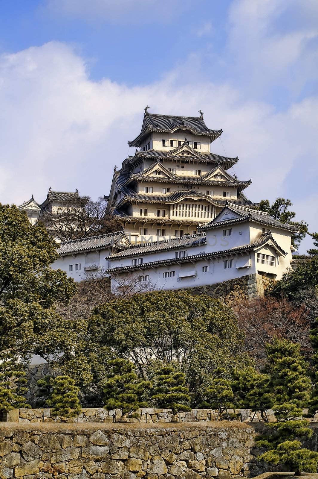 Ancient Samurai Castle of Himeji with Blue Cloudy Sky.  Japan.