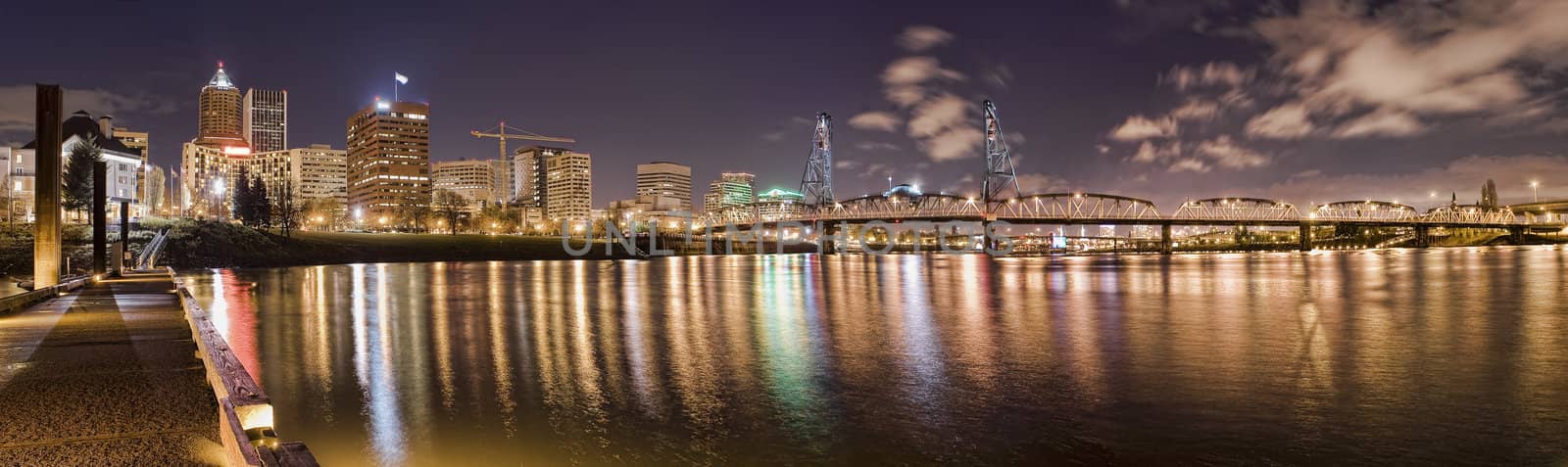 Portland, Oregon Panorama.  Night scene with light reflections on the Willamette River