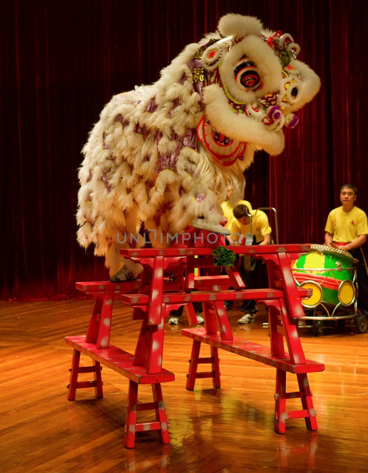 MACAU - APRIL 25: The traditional Chinese lion dance on stage, April 25, 2009, Macau