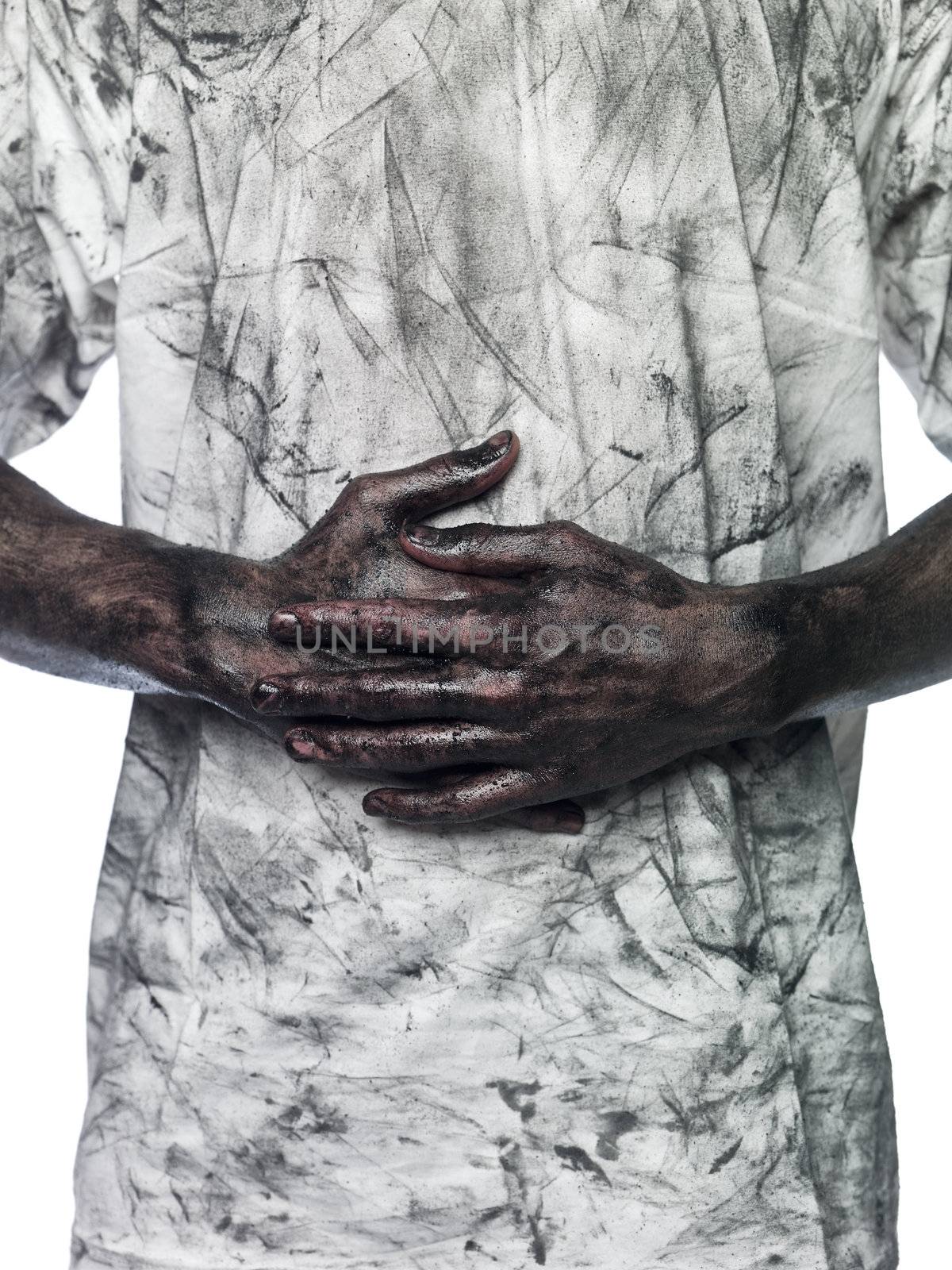 Dirty hands in front of a dirty shirt